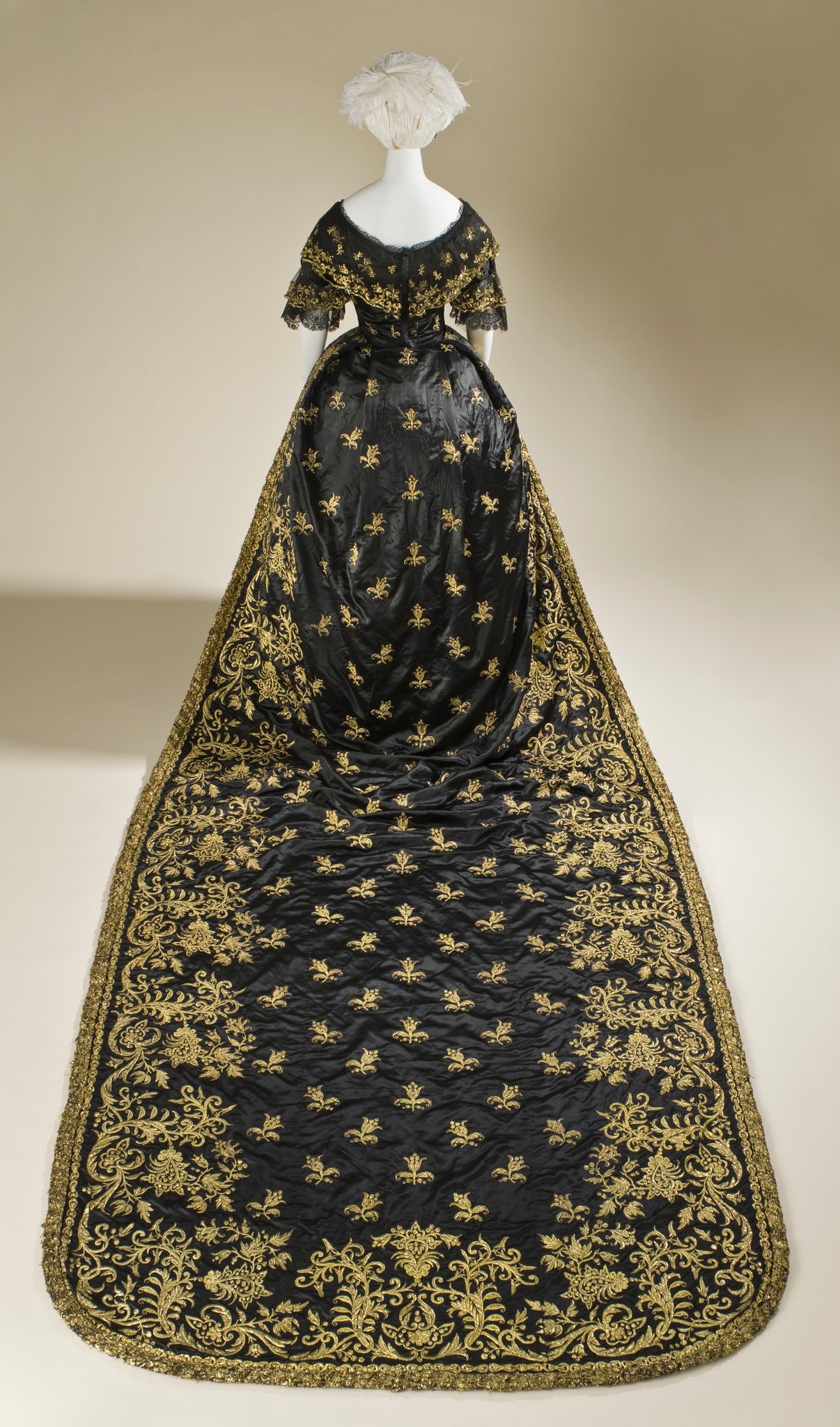 Question on what fabric(s) should you use to line a dress skirt train? I'm using a similar fabric weight/type to this image is suede velvet. But not making this dress. I'm going