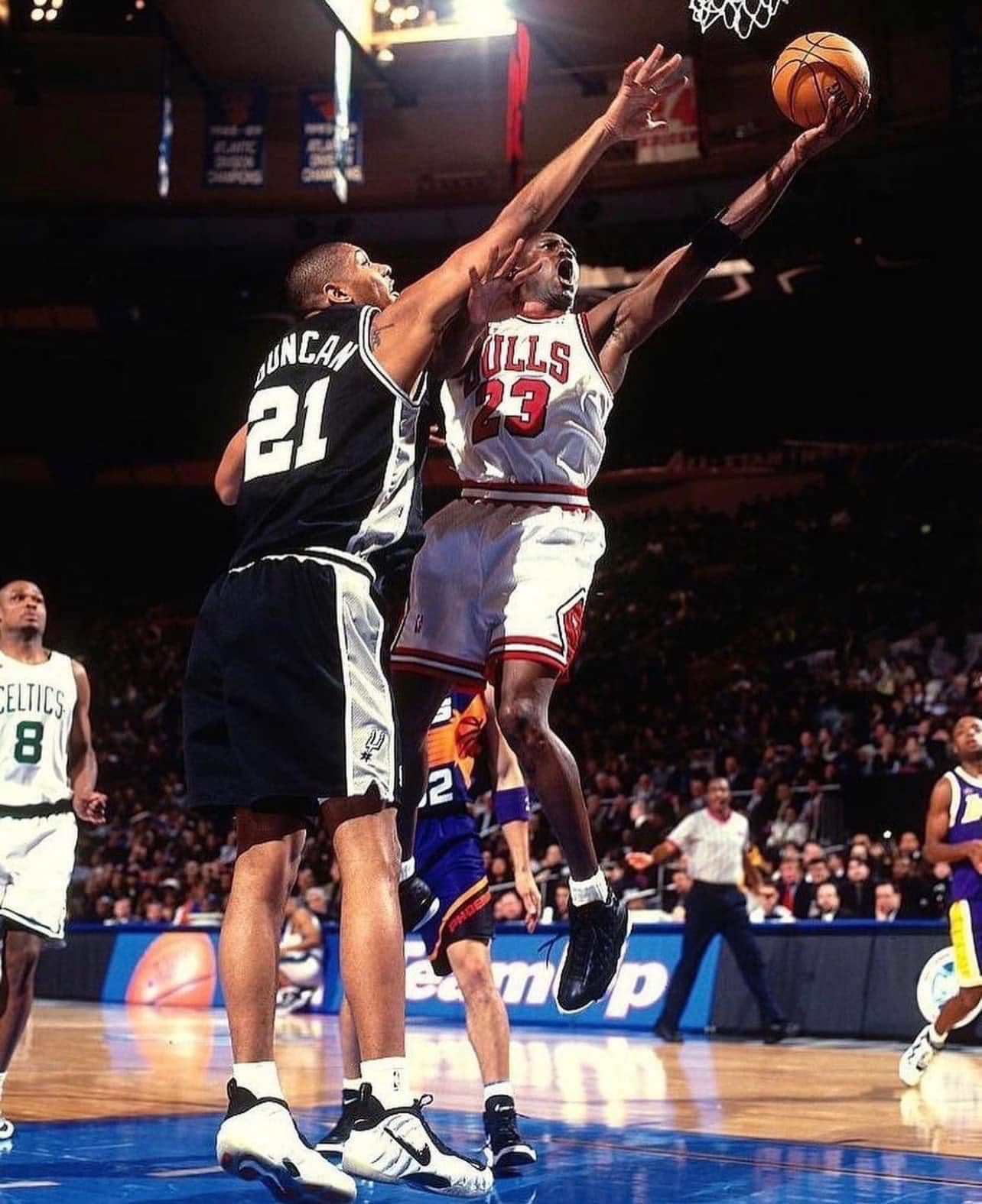 Tim Duncan & David Robinson on May 1998 Sports Illustrated For 