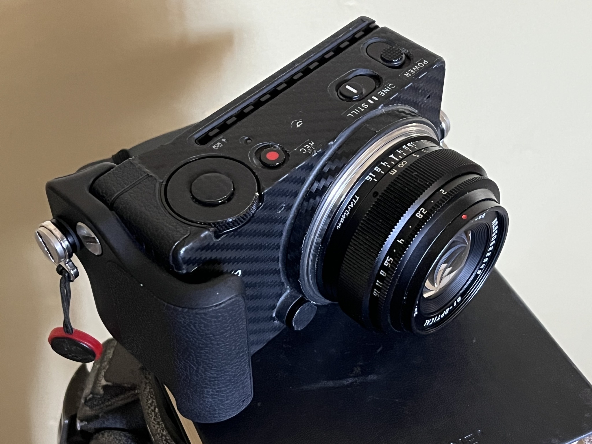Has anyone compared the new TTArtisan 40mm f/2 with the Sigma 45mm