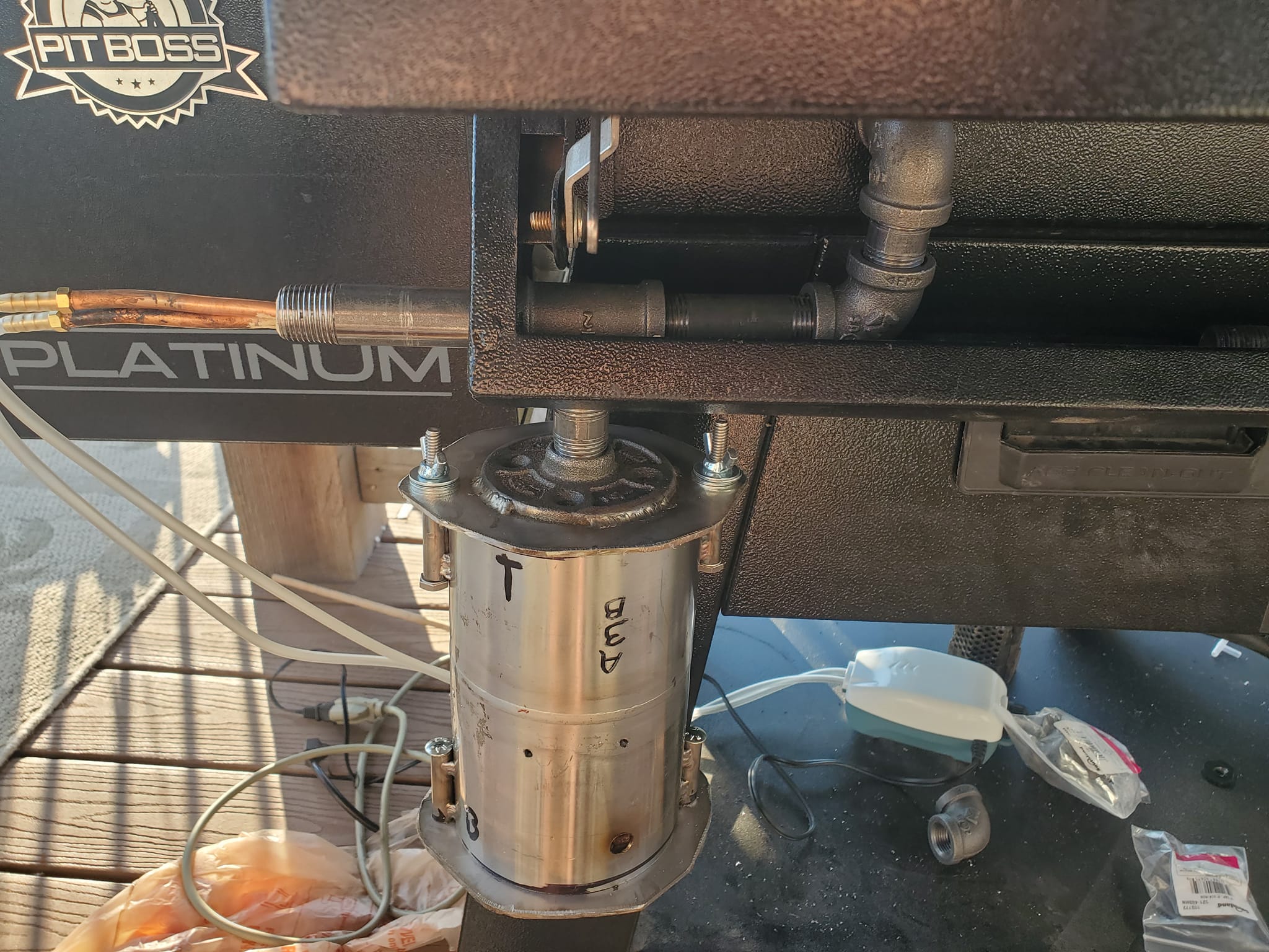 Where to mount Smokai cold smoking tube on Xfire grill?