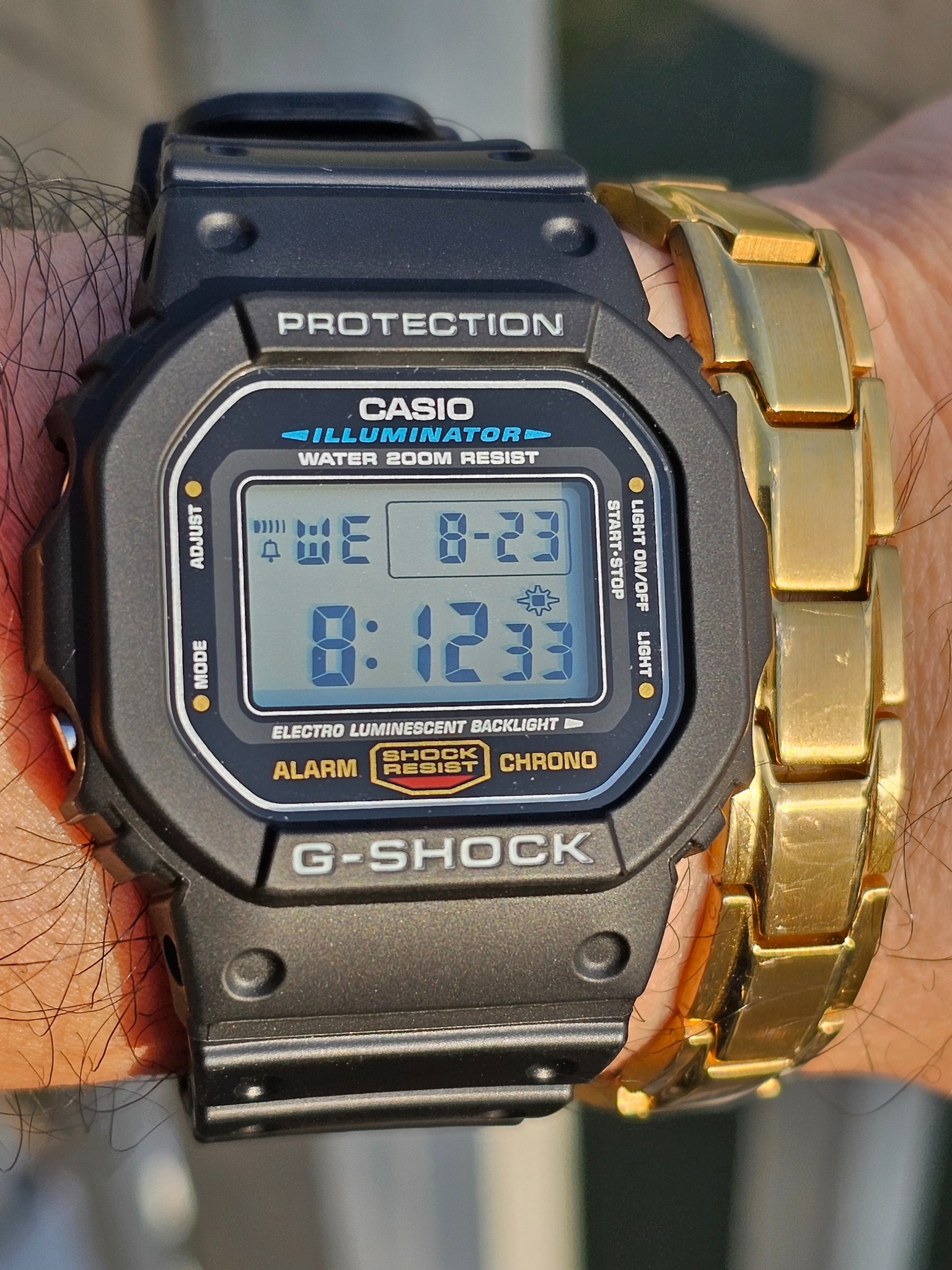 DW-5600C-9V watch with replaced strap and bezel