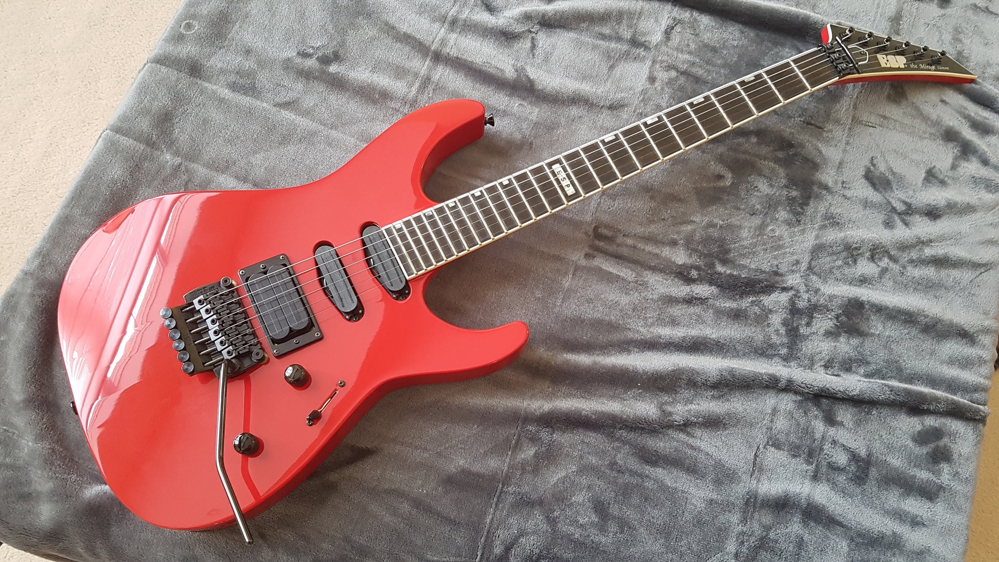 Mirage custom guitar lawsuit headstock stock condition