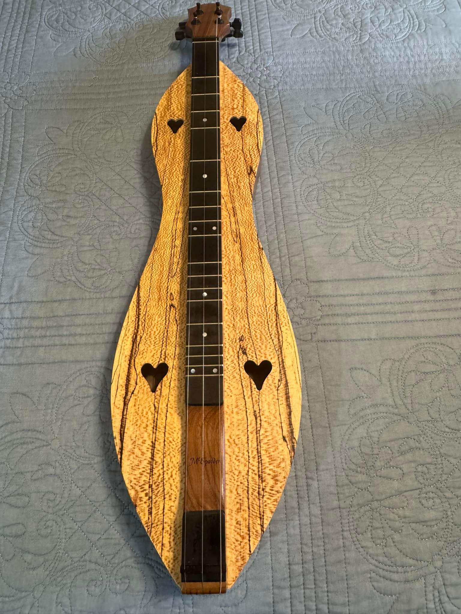 Vintage McSpadden dulcimer on display at The Dulcimer Shoppe