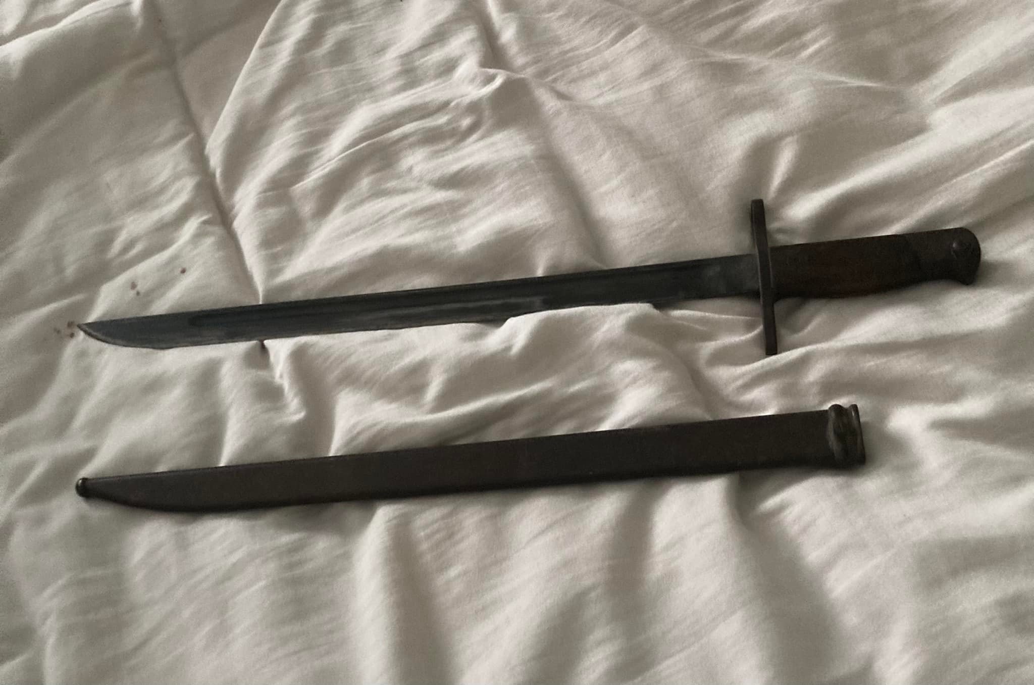 What is this antique sword or bayonet with markings?