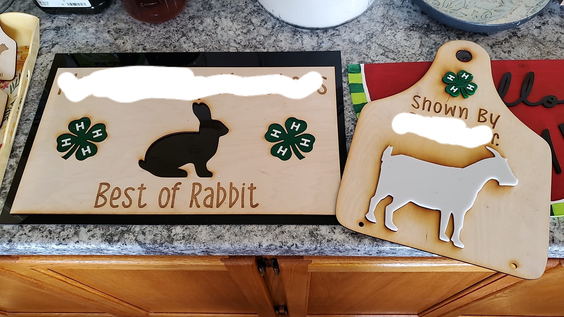 What glue is best for bonding stall signs in 100 degree heat?