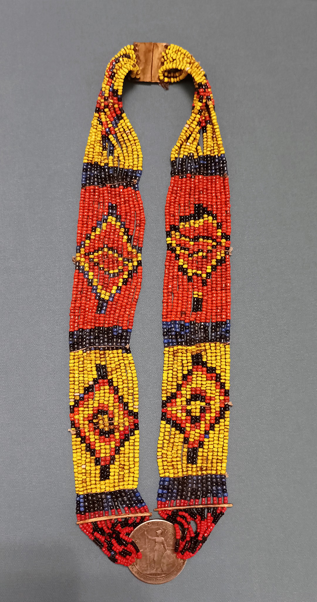Borneo shaman necklace with Islamic motifs and wood figures