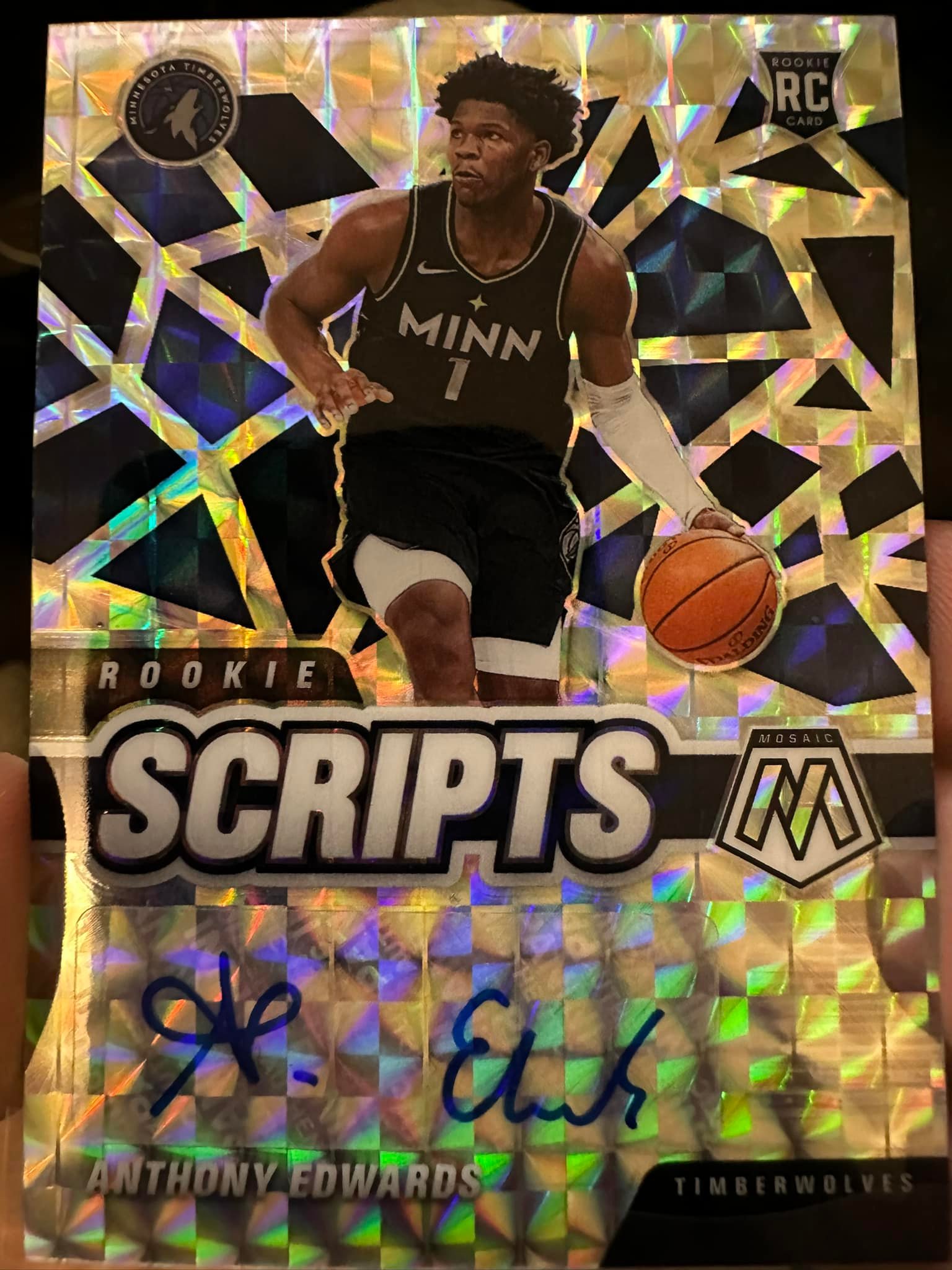 Damaged Anthony Edwards rookie card from 20-21 Mosaic Mega