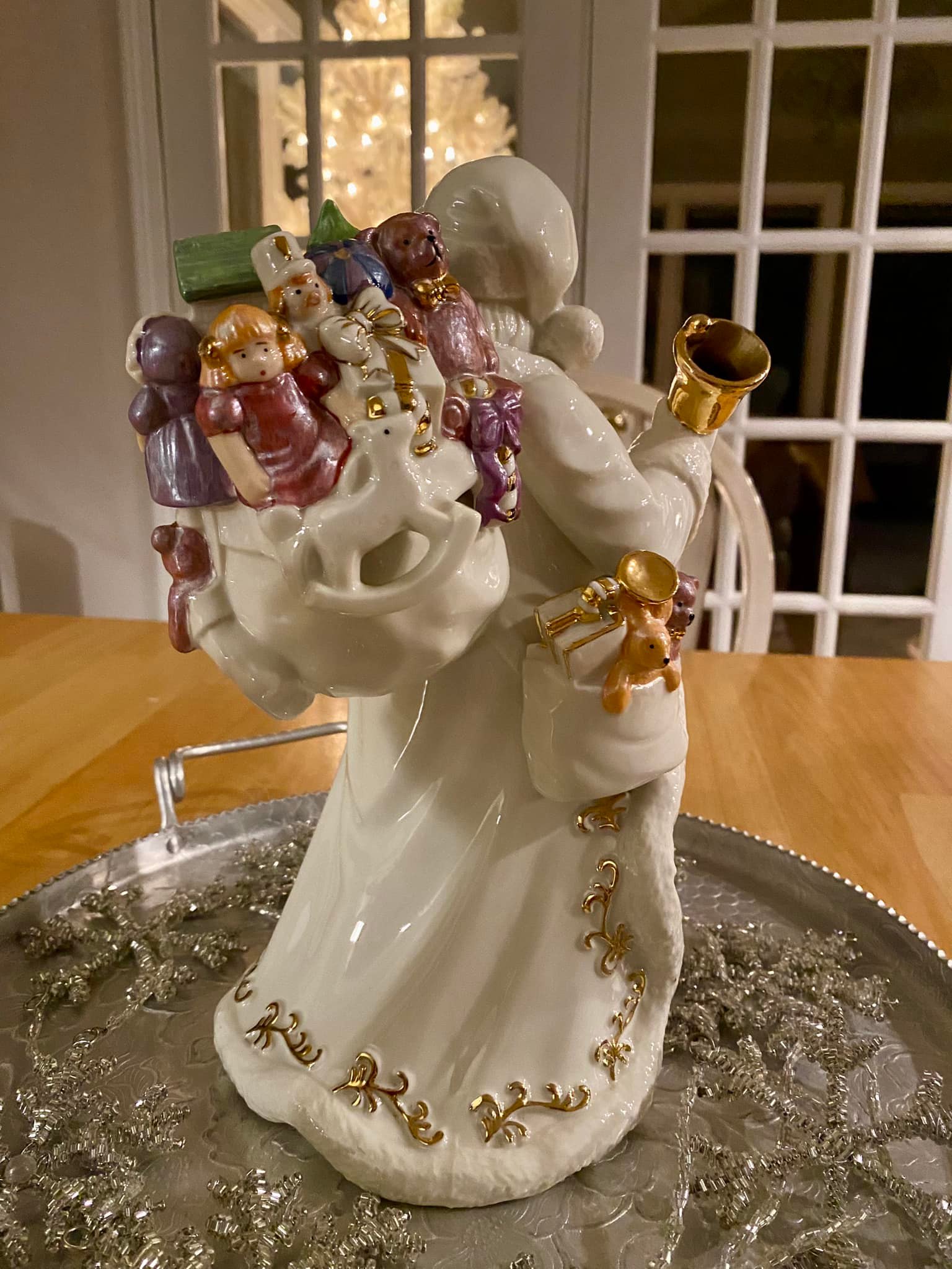 What is the origin of this 11-inch Santa figurine?