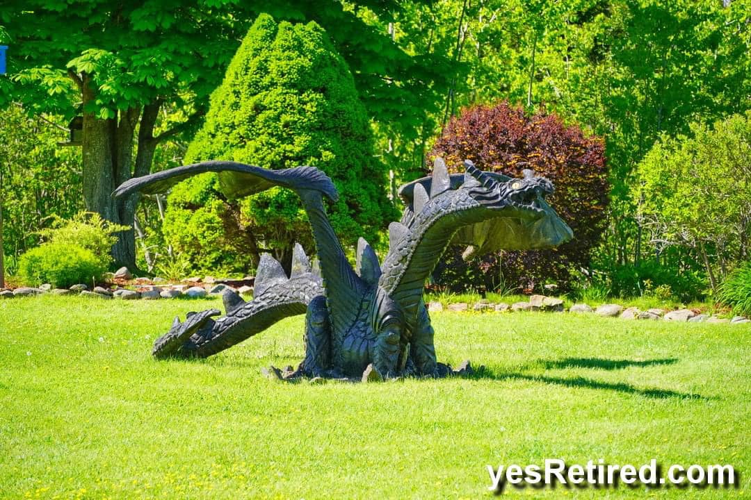 Memorable drive near Walton on Fundy with huge dragon lawn ornament