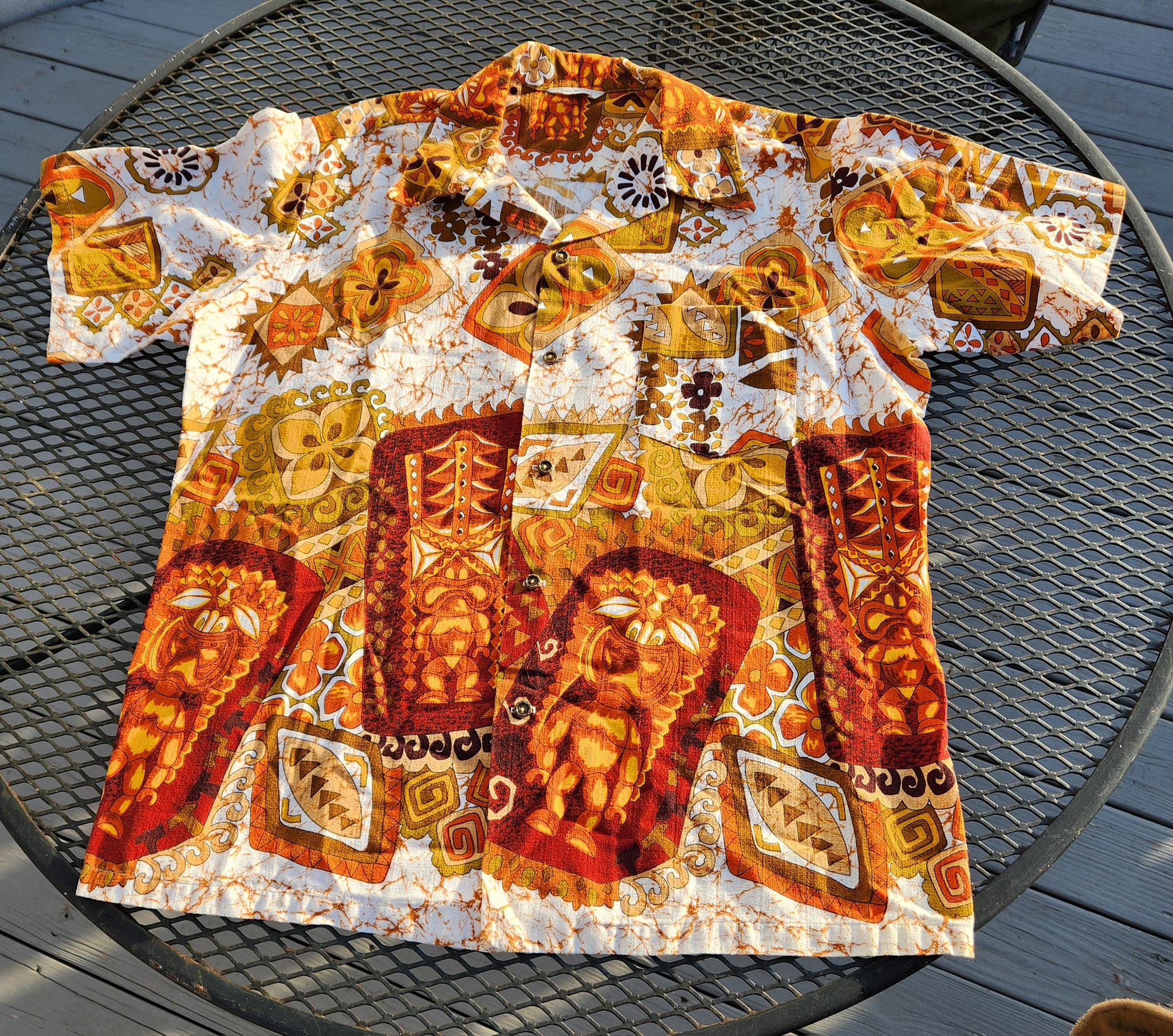 Vintage Hawaiian shirt with tikis from the late 60s or early 70s