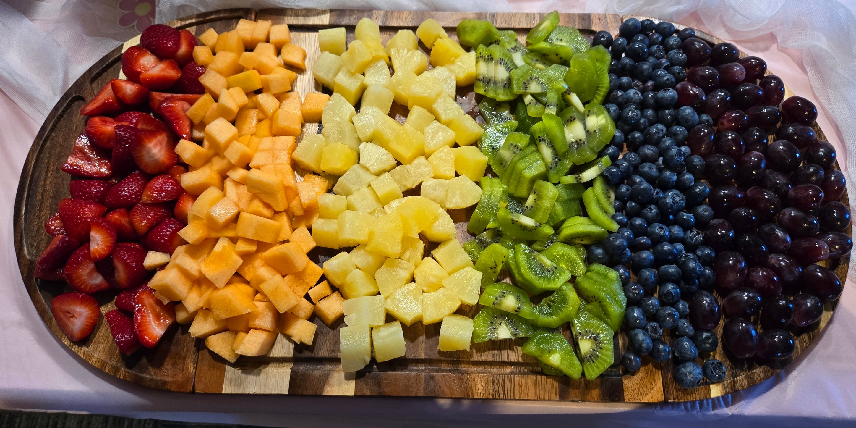 Delicious baby carriage fruit platter for baby shower