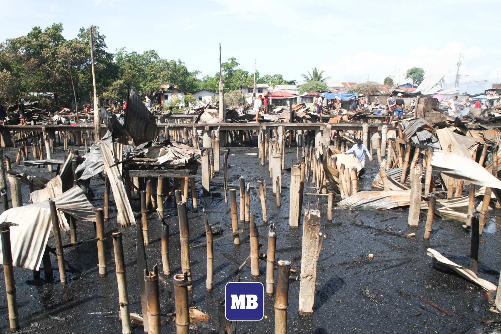 MANILA BULLETIN - LOOK: Fire survivors scour for whatever is left of ...