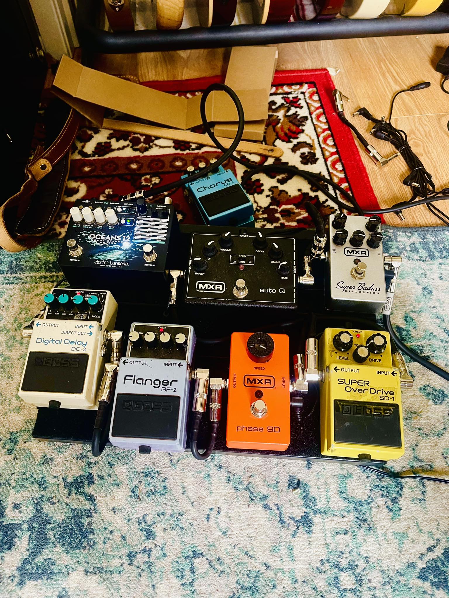 Vintage pedal collection including Boss CS-2 and EHX Black Finger