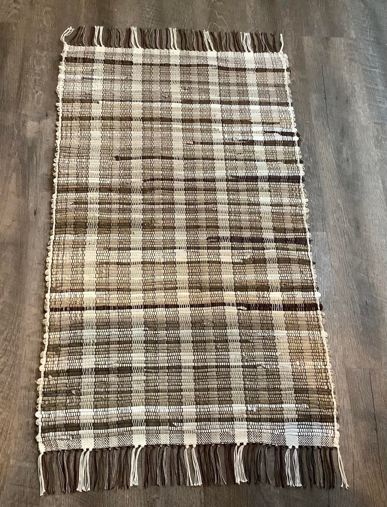 Weaving rugs with vintage brown wool scraps