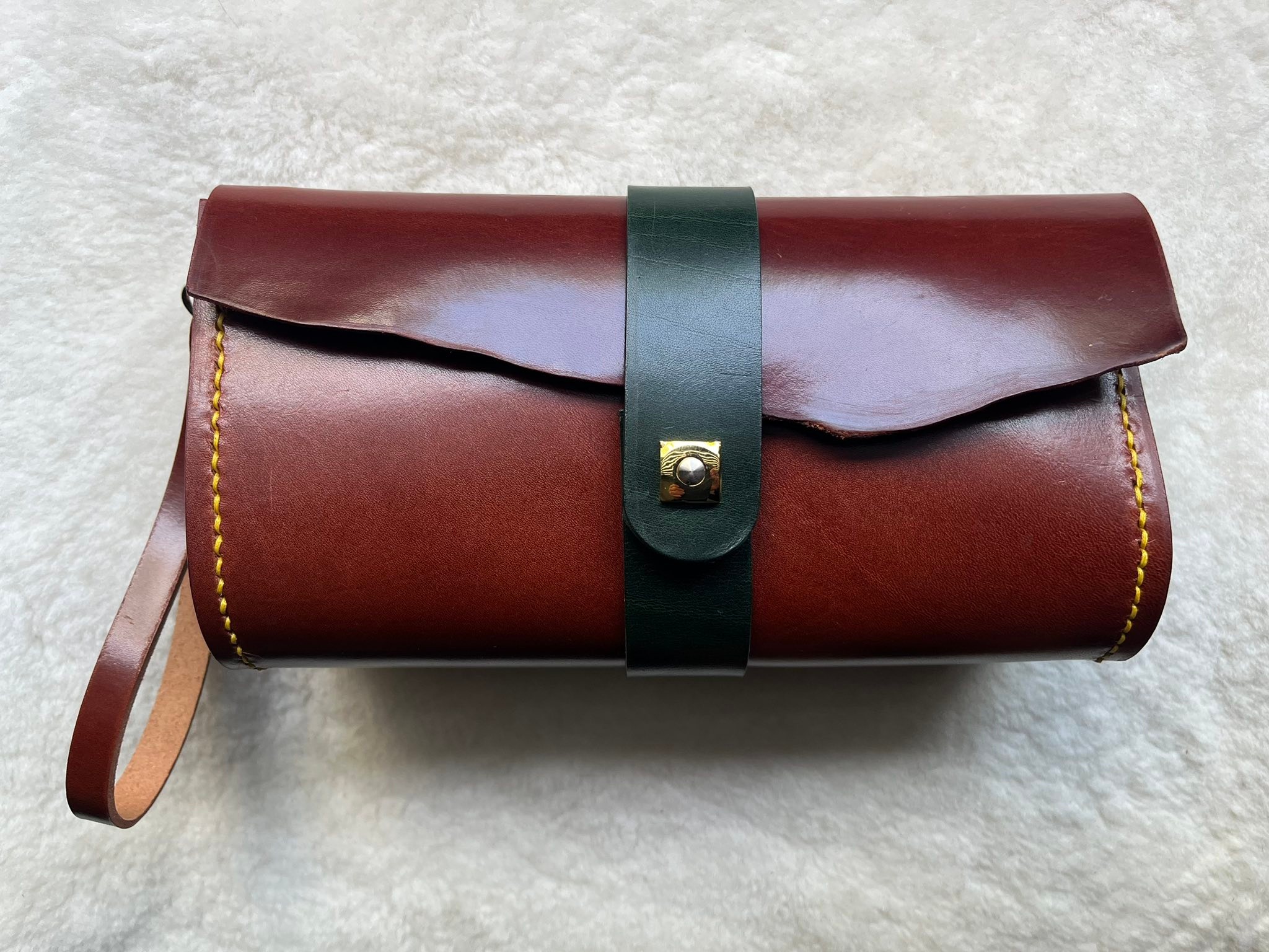 Leather clutch with hide edge