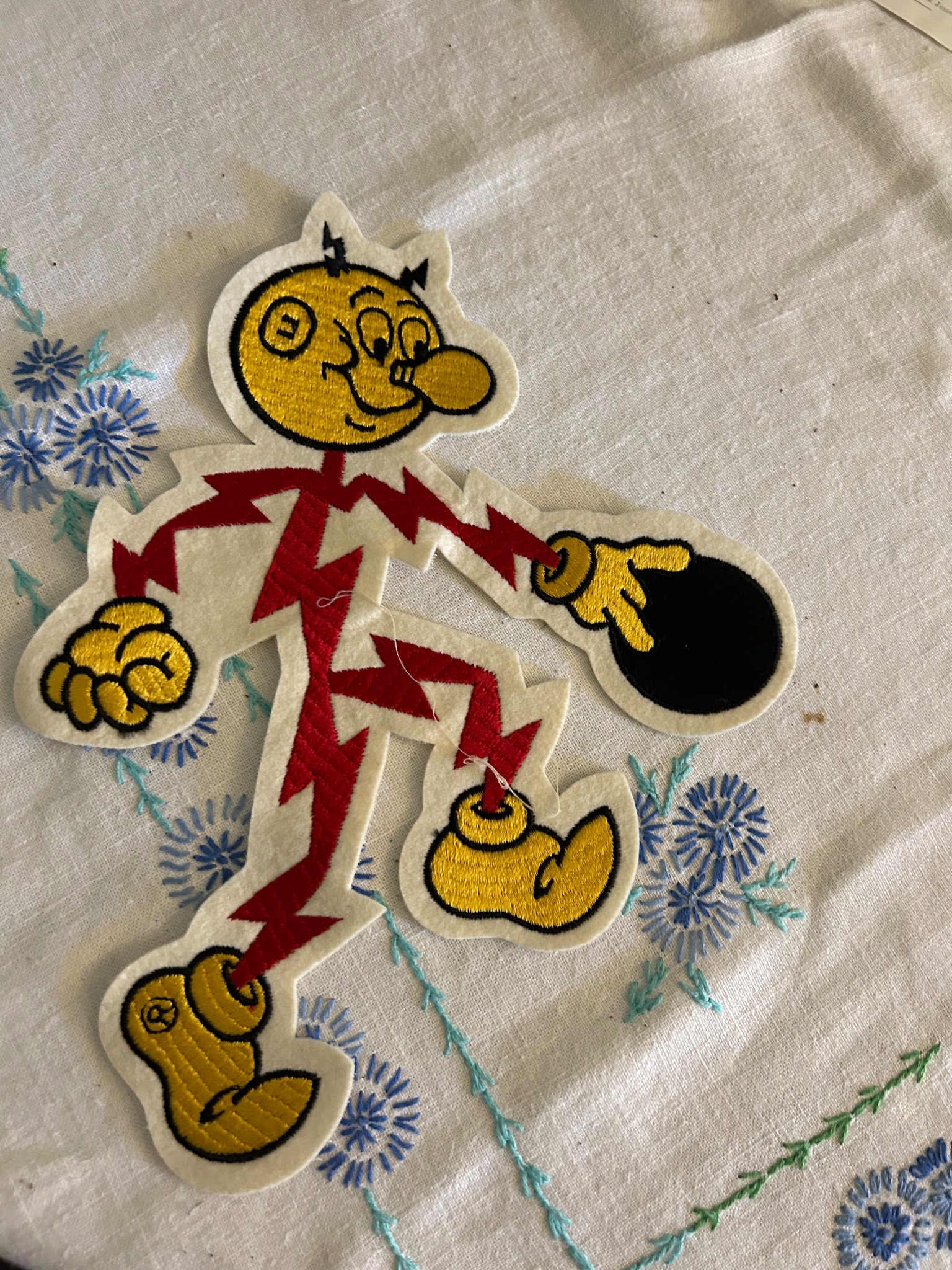 Vintage Reddy Kilowatt charm or keychain