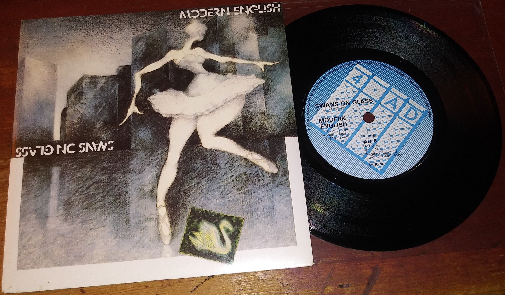 Swans - Holy Money on PVC Records. S.W.A·N·S S S S.W A $ HOLY
