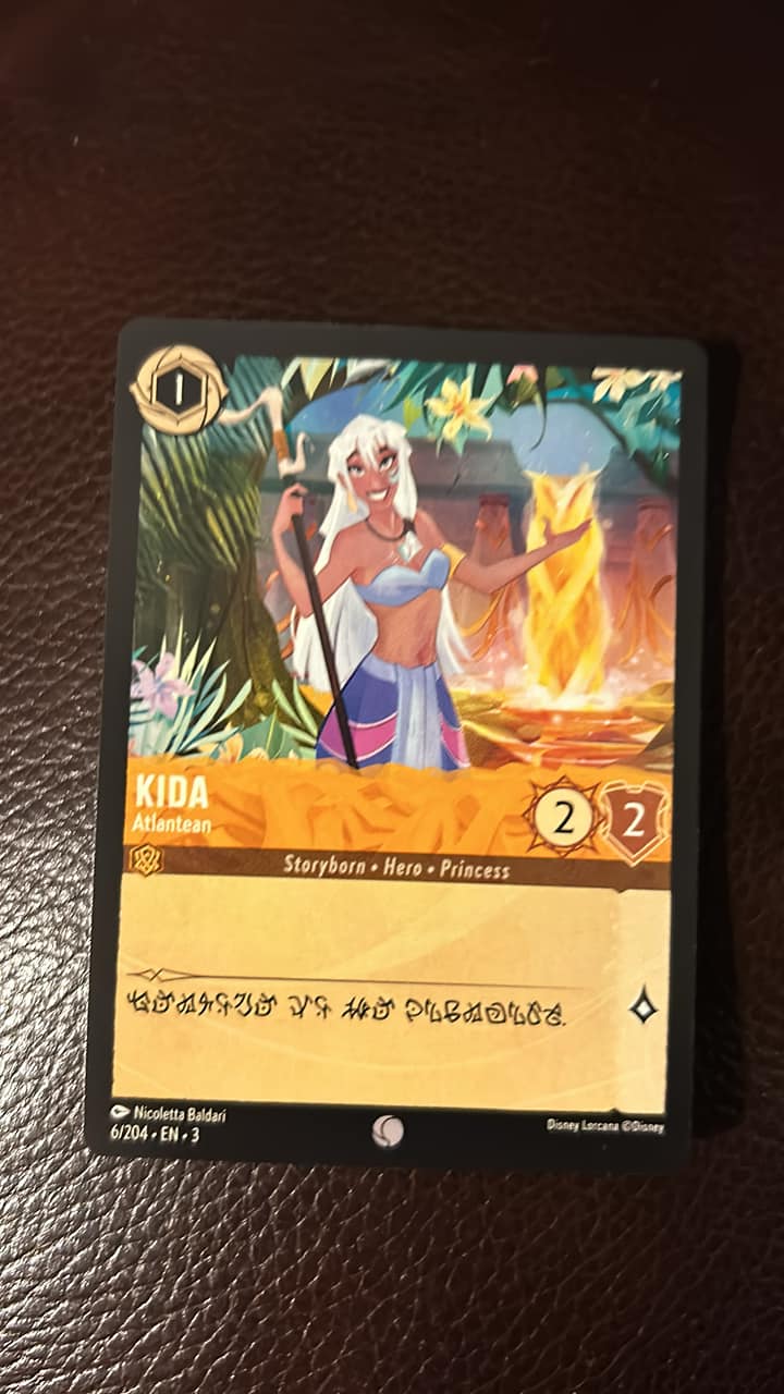 Which Disney Lorcana card is the error card, foil or non-foil?