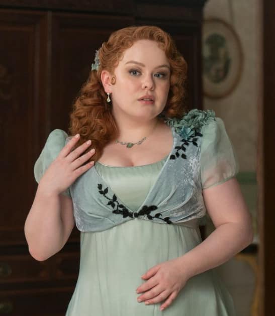 Is Penelope's dresses green or blue?
