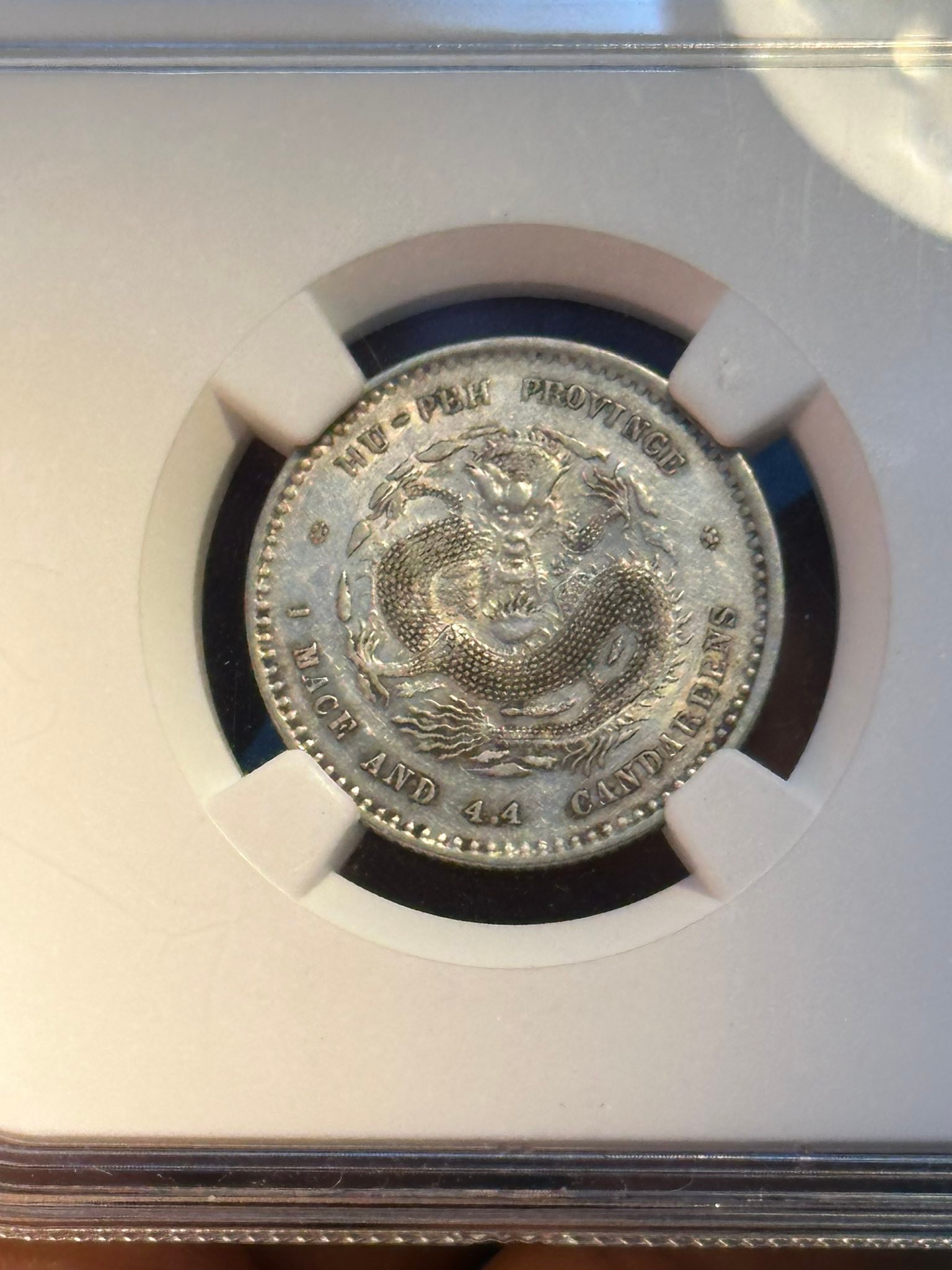 Silver dragon coin for sale