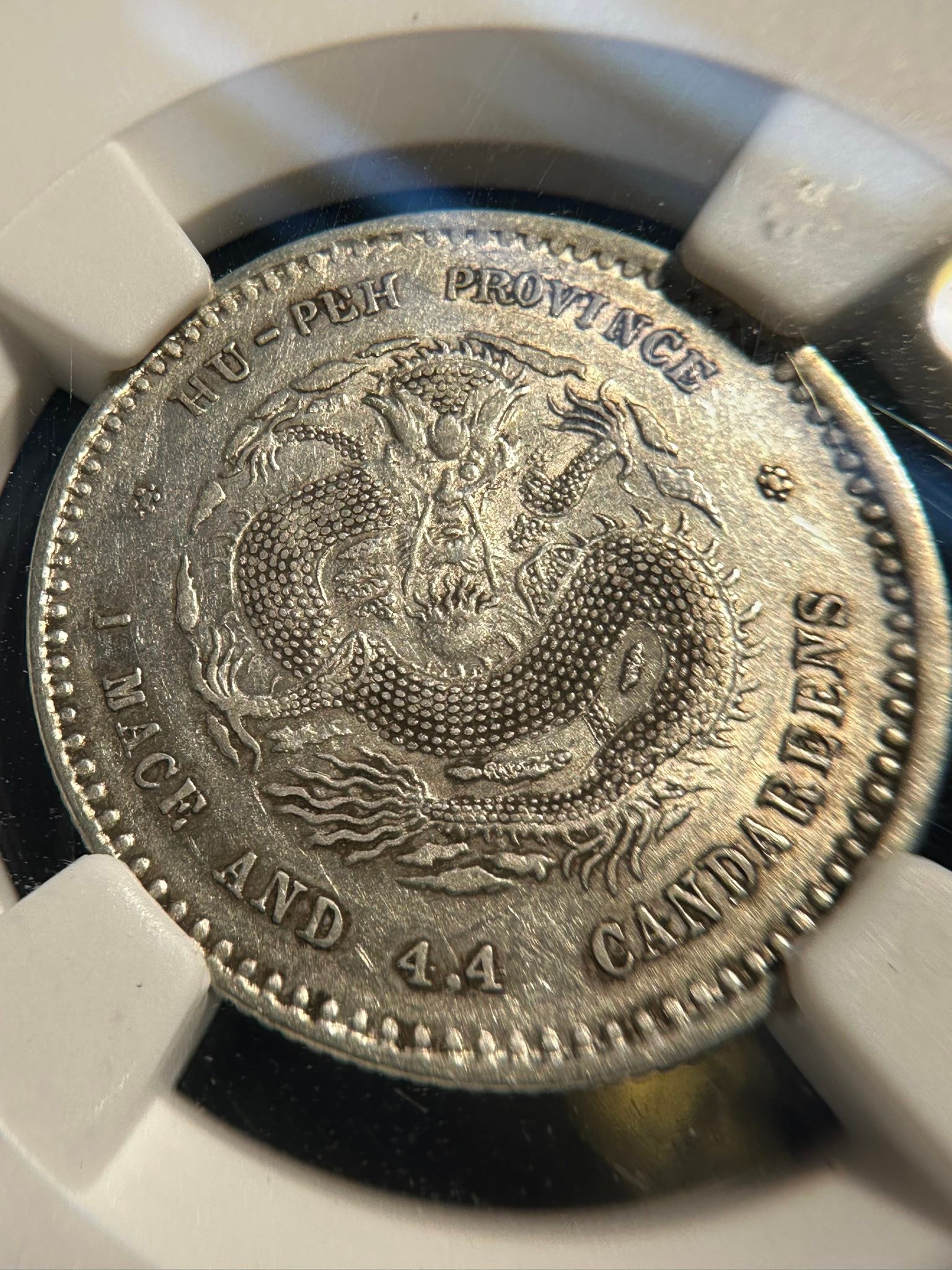 Silver dragon coin for sale