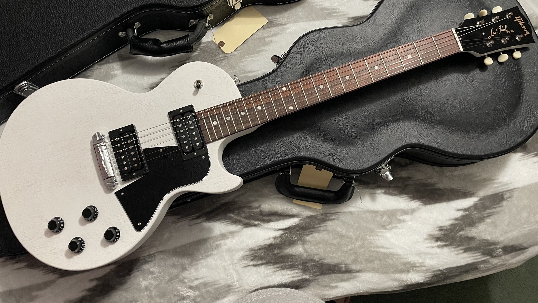 It says Les Paul, but I think of it as more of a Melody Maker or