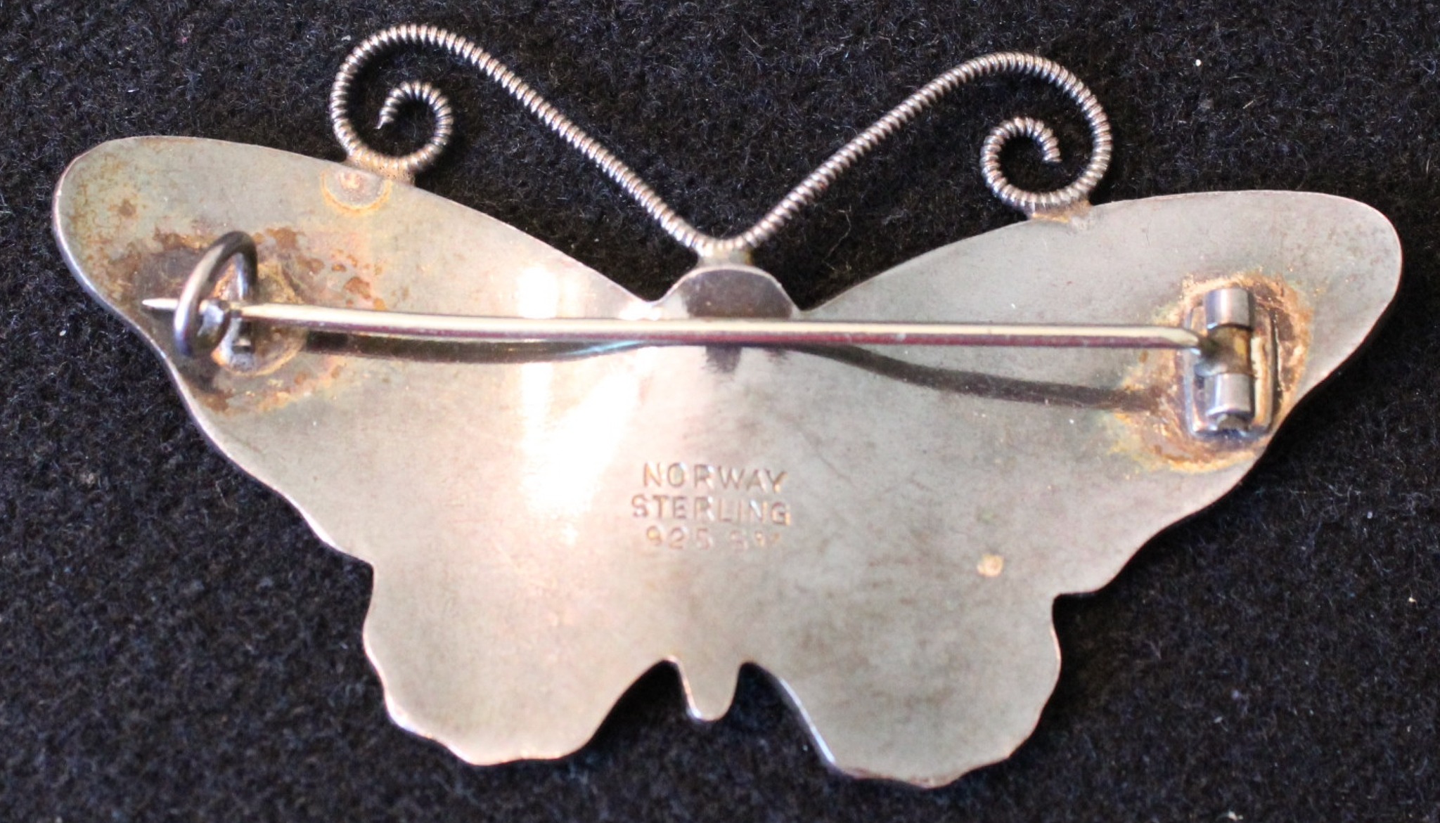 What is the origin and value of this Norwegian enamel butterfly