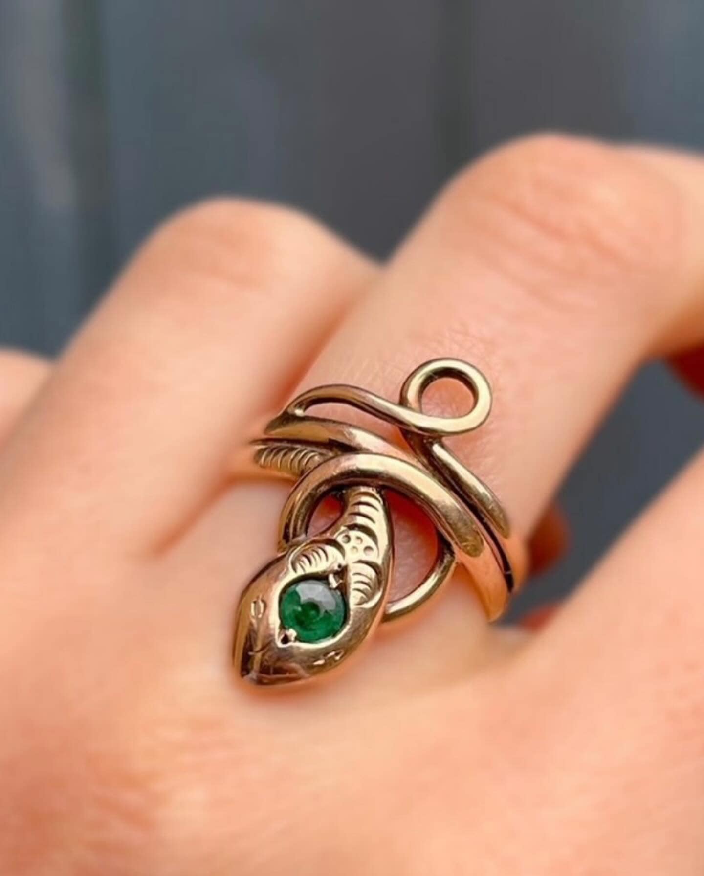 What is the origin and value of a vintage ring with intertwined 