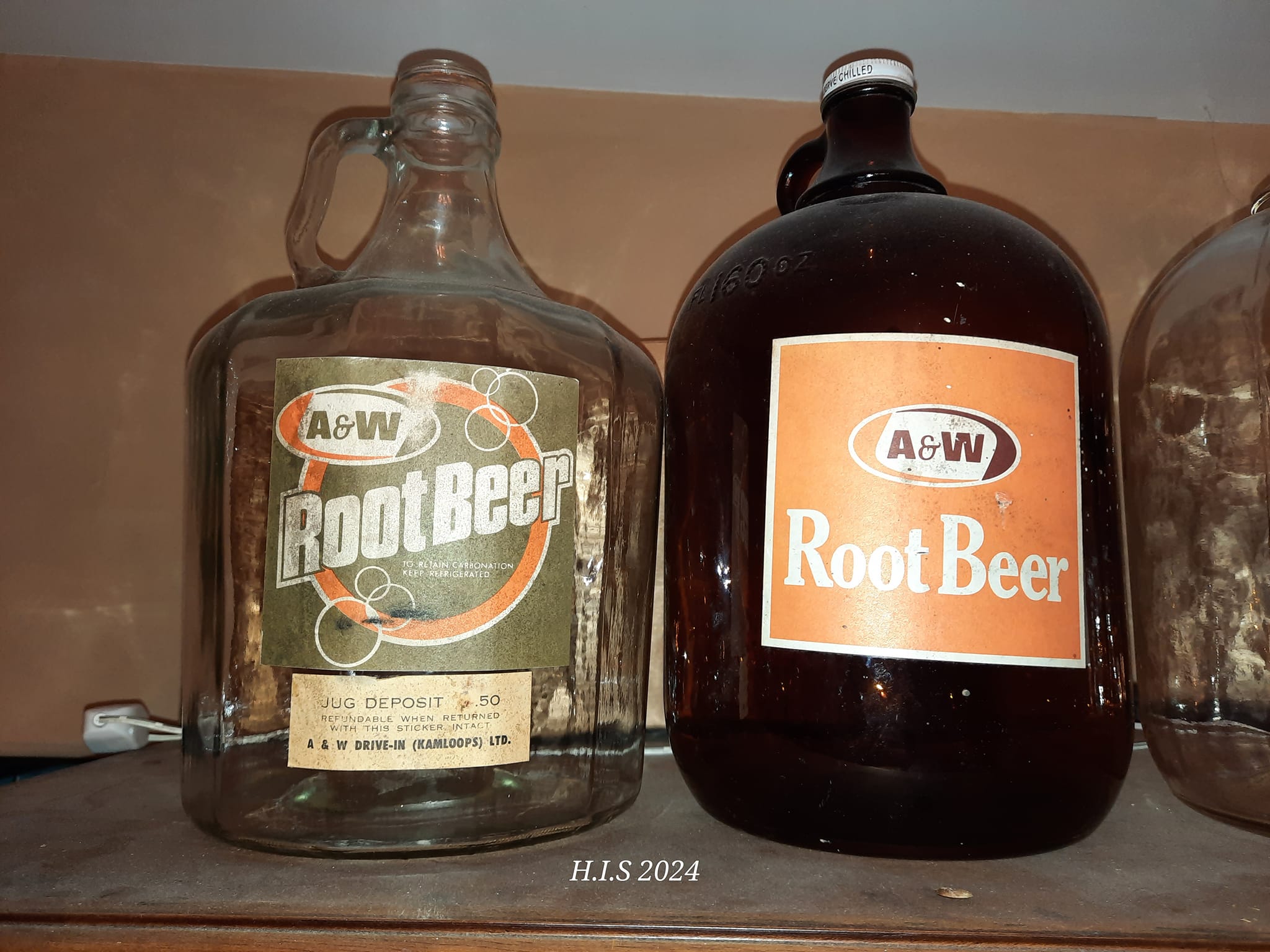 A&W collectible jugs in rough condition