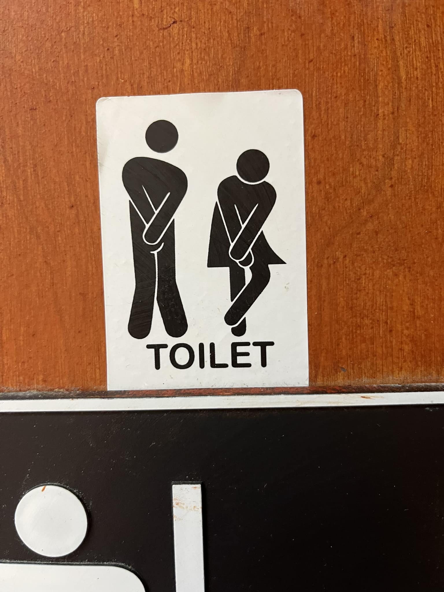 Unusual Restroom Sign at Asian Supermarket in Peoria Arizona