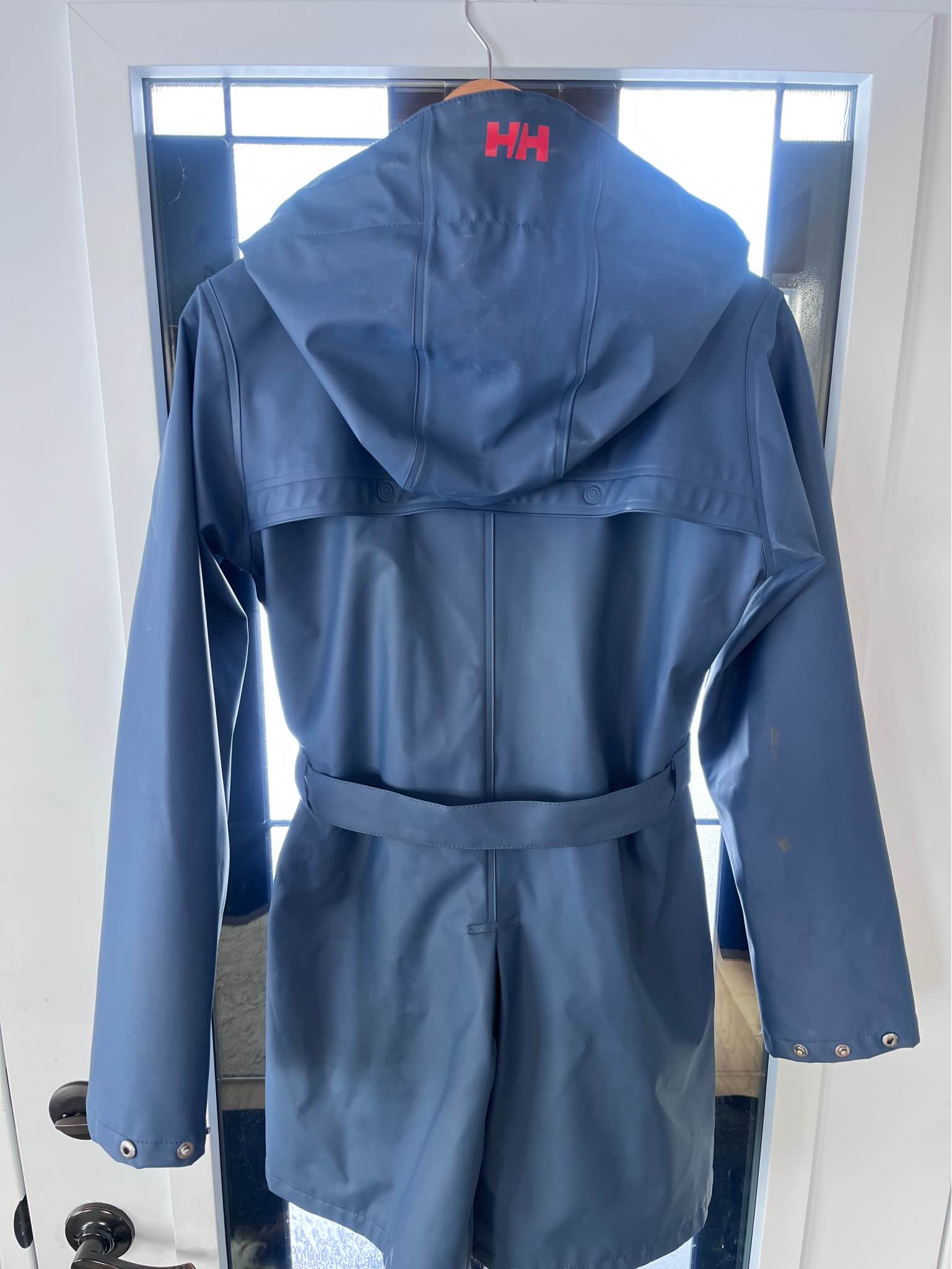 Navy Helly Hansen Rain Jacket with striped lining. Women
