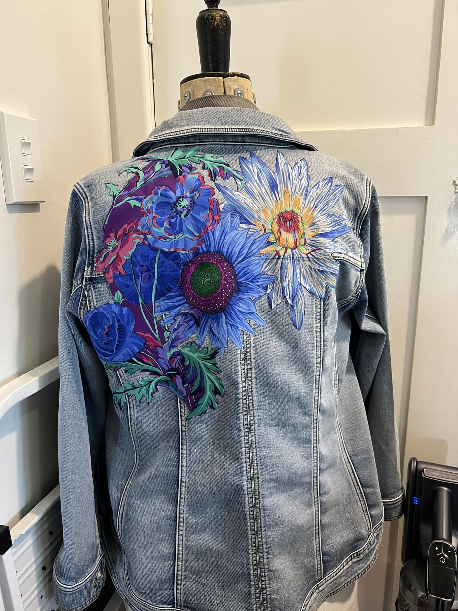 Denim jacket embellishment with cotton fabric flowers