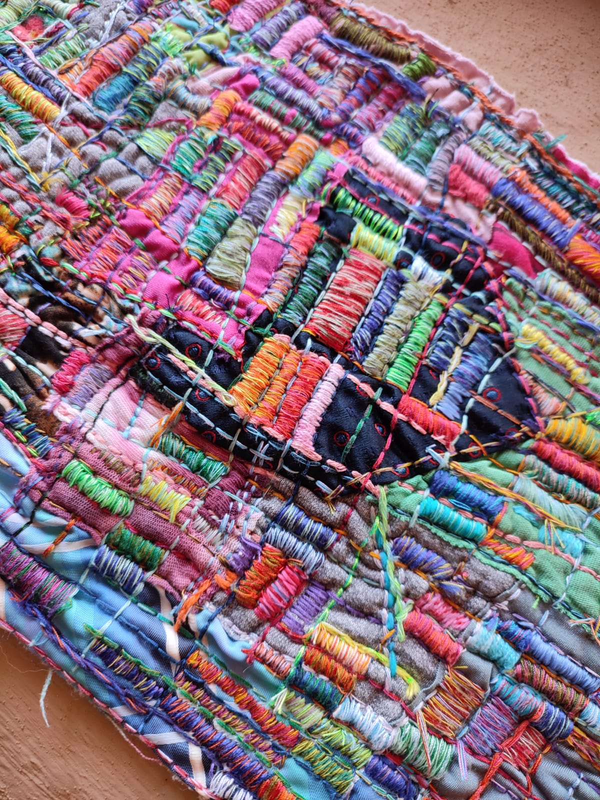 Creating a Colorful Textile Piece with Scraps of Fabric and Stitching
