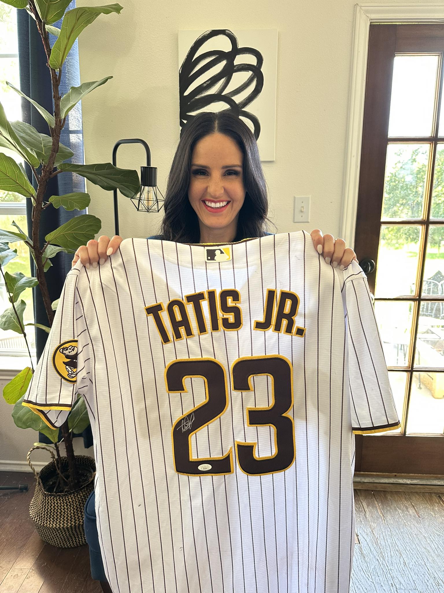 Game-worn autographed Tatis Jr jersey as birthday gift
