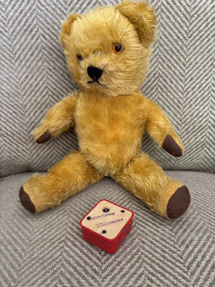 What is the make and age of this restored teddy bear with Swiss