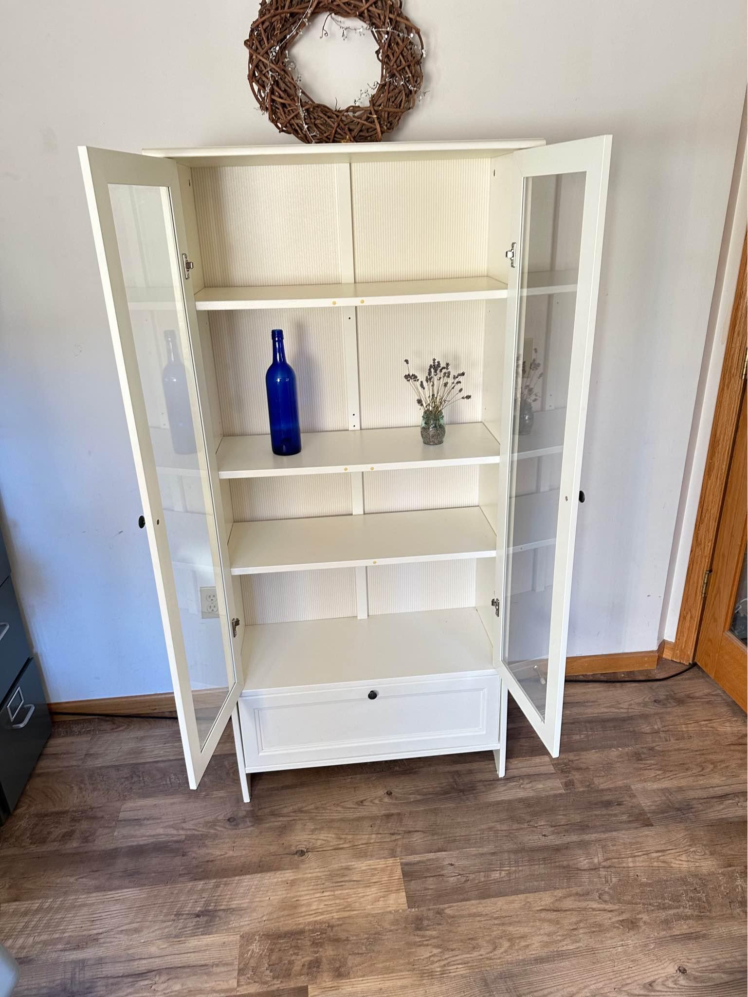 Large Ikea Syvde glass display cabinet with sliding glass doors