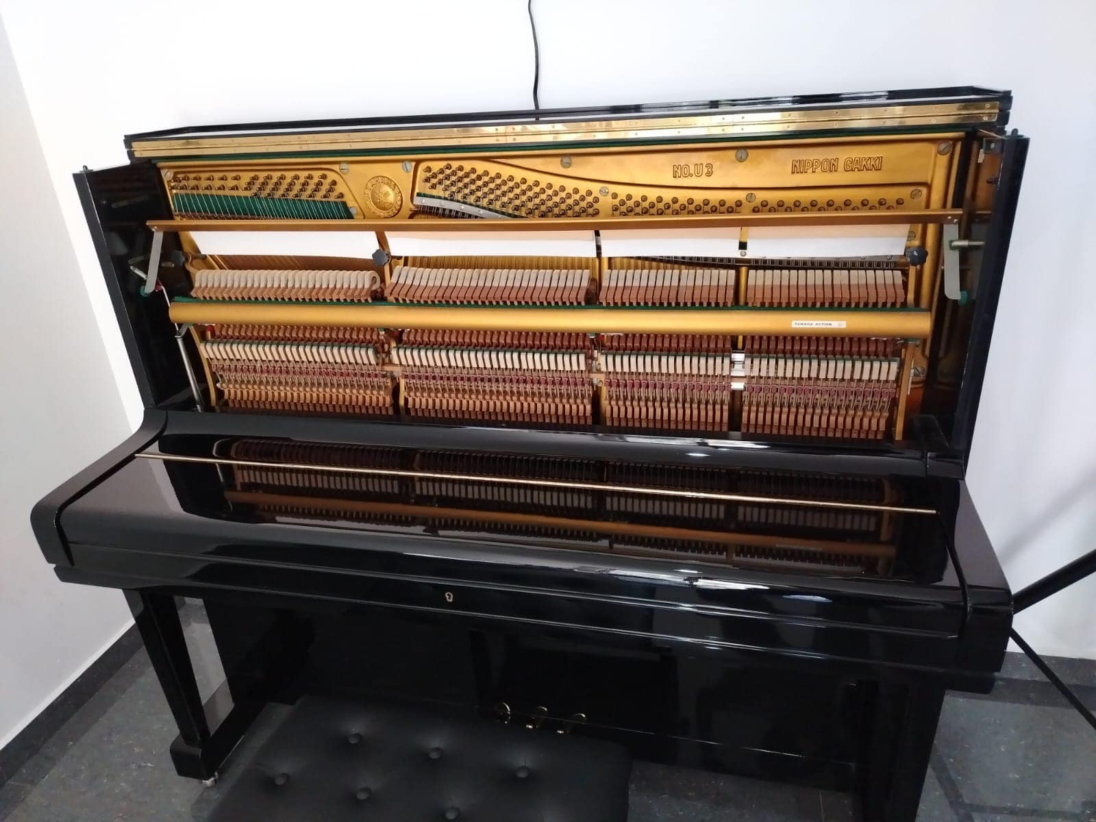Based on the provided serial number 494773, this Yamaha U3 Nippon 
