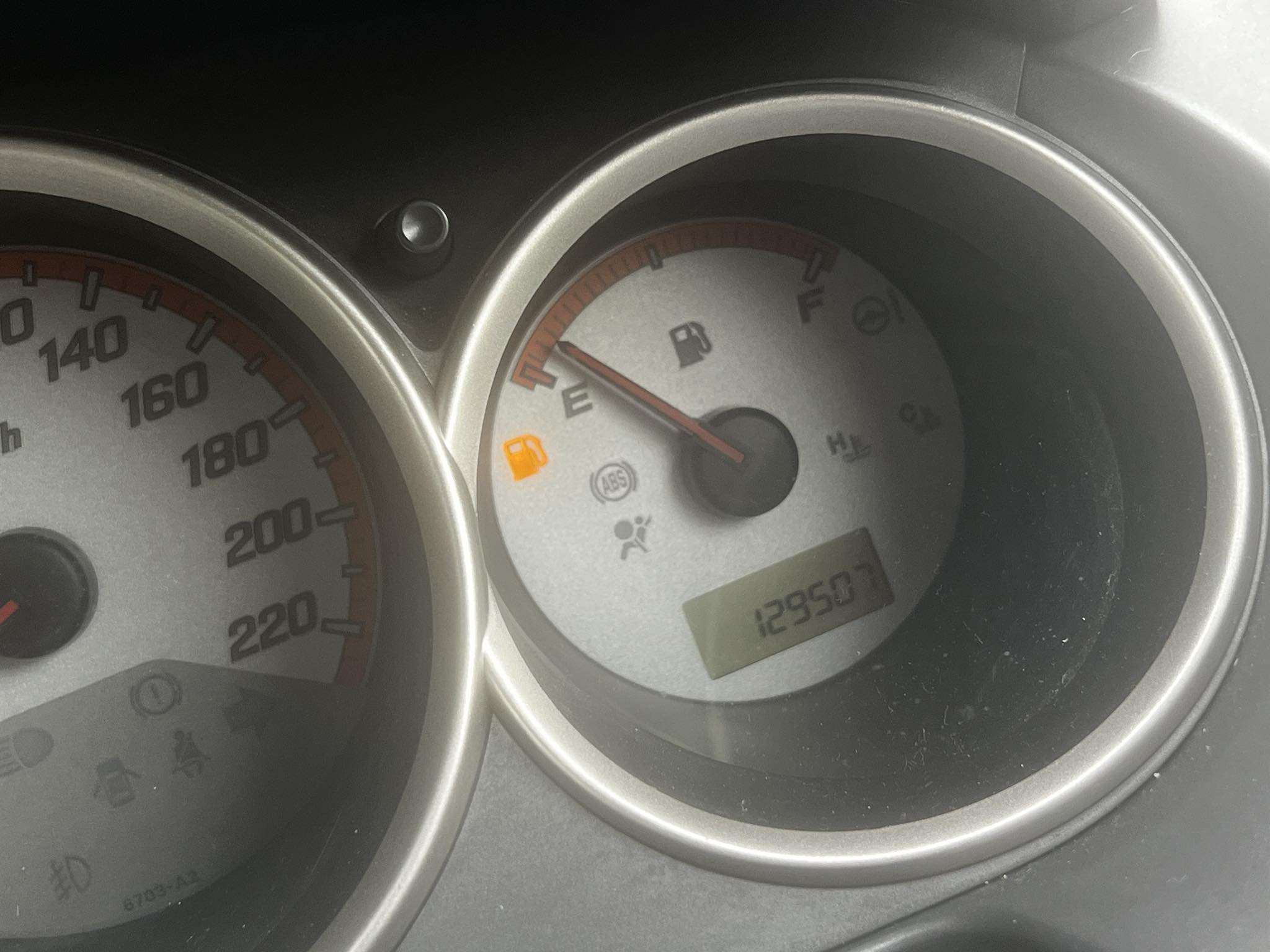 What does the orange light on the dashboard mean?