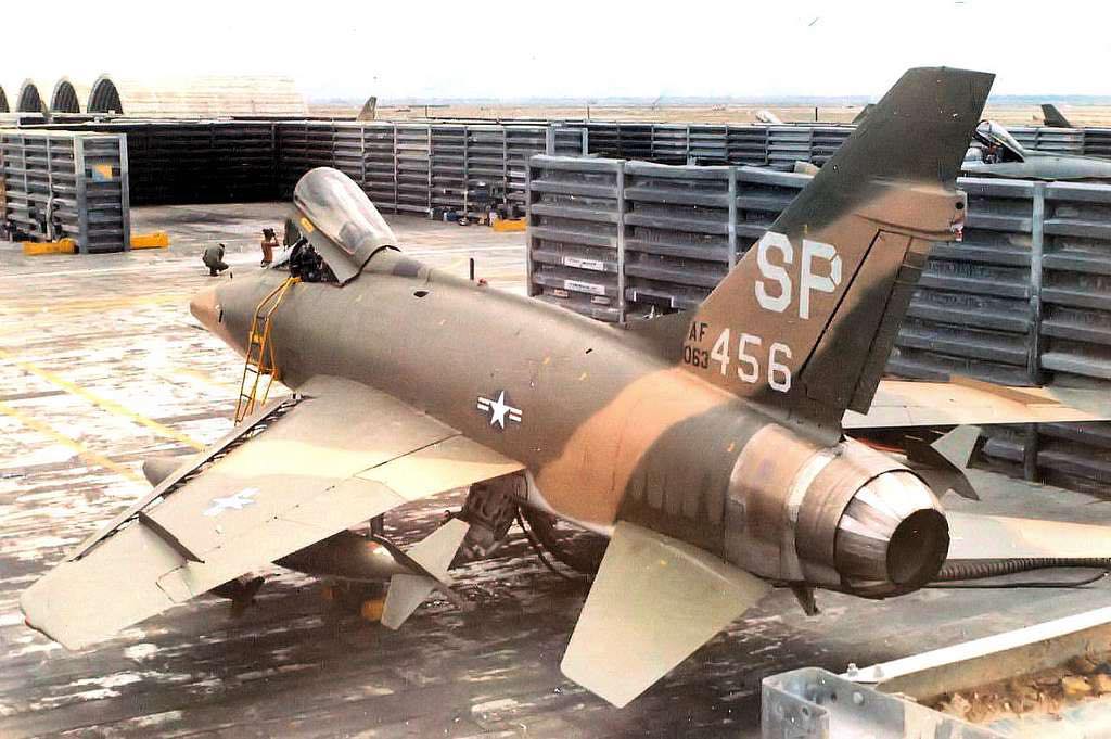 Here is a photo of a South East Asian (SEA) camouflage F-100 Hun
