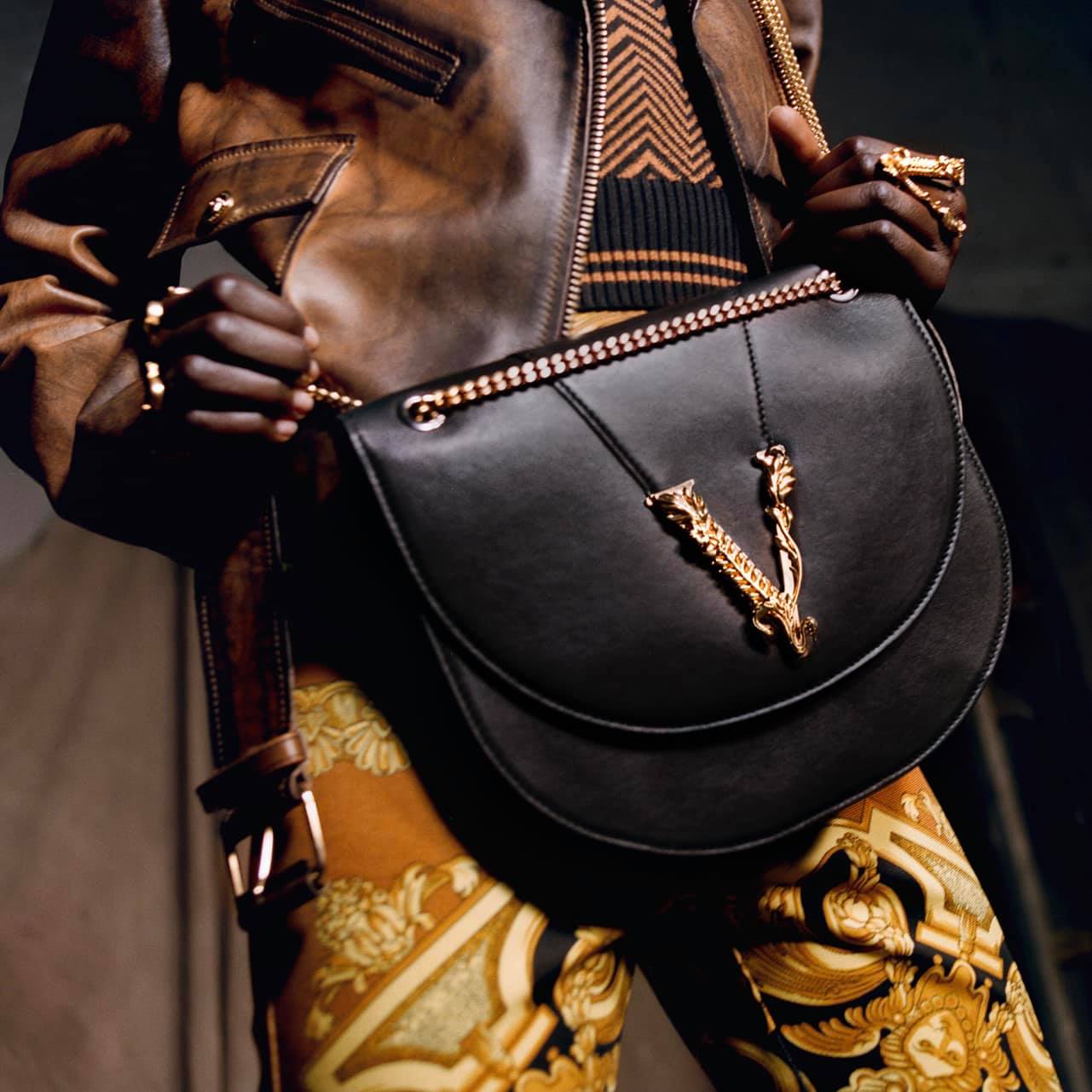 A bold symbol of the brand's aesthetic heritage, the central gold
