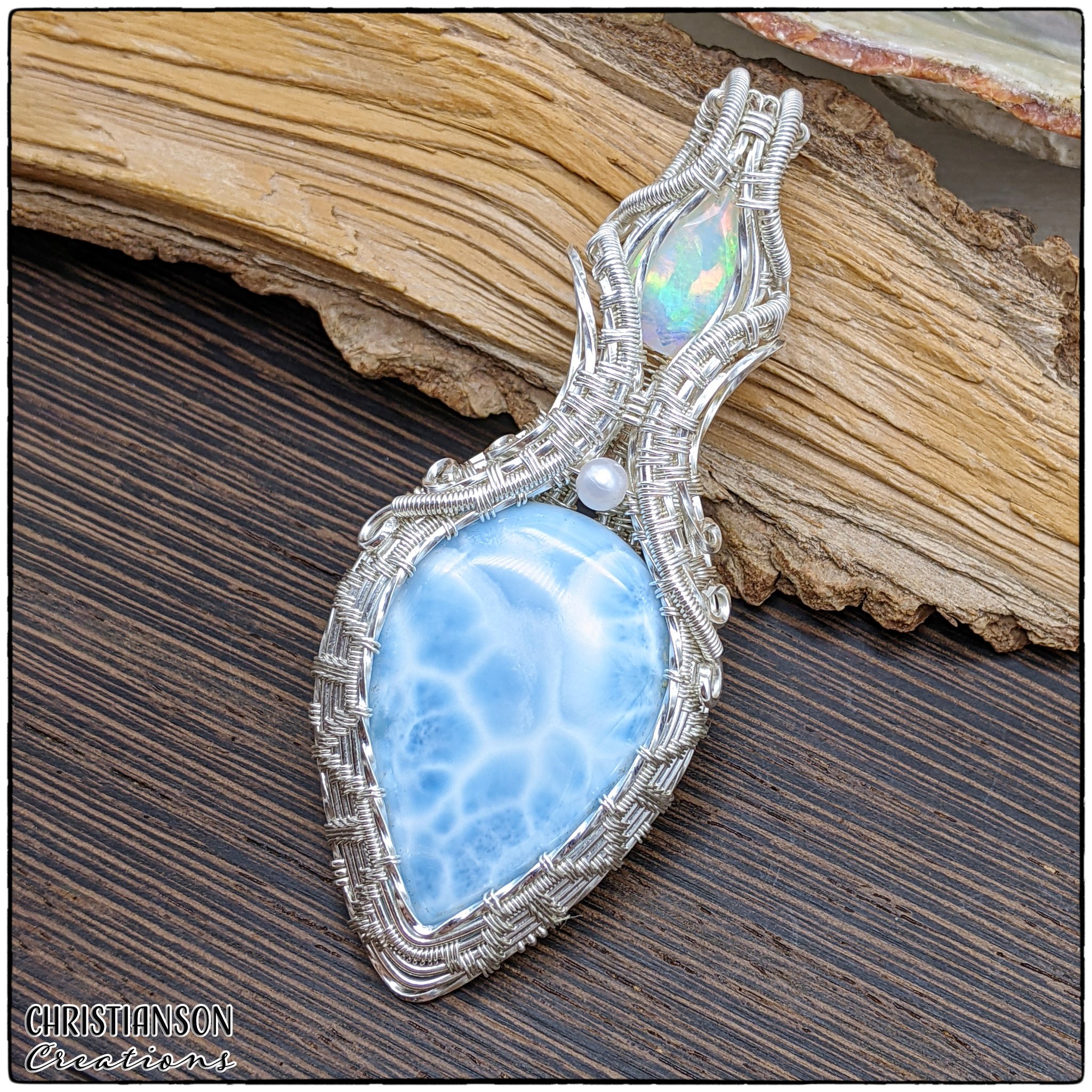 Larkavite stone on a sterling steel shield shaped and handmade 