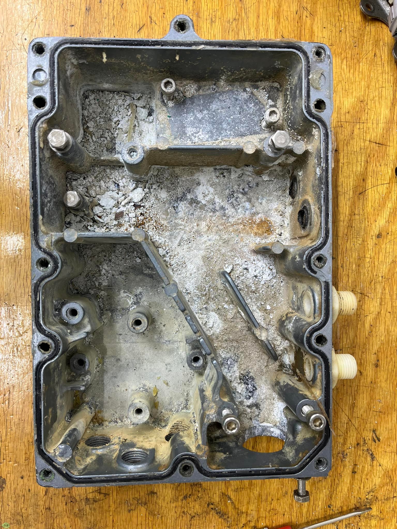What are the best practices for sealing coils and ignitor boxes in