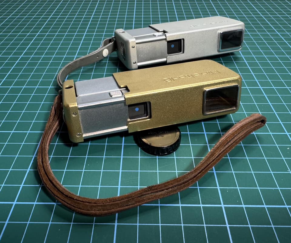 Vintage Minolta 16 camera collection with original accessories