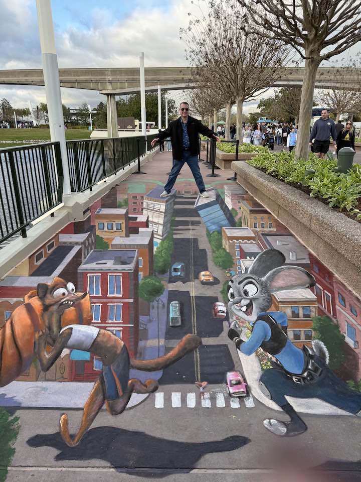 A large-scale 3D chalk mural is at Flatiron Plaza in Manhattan