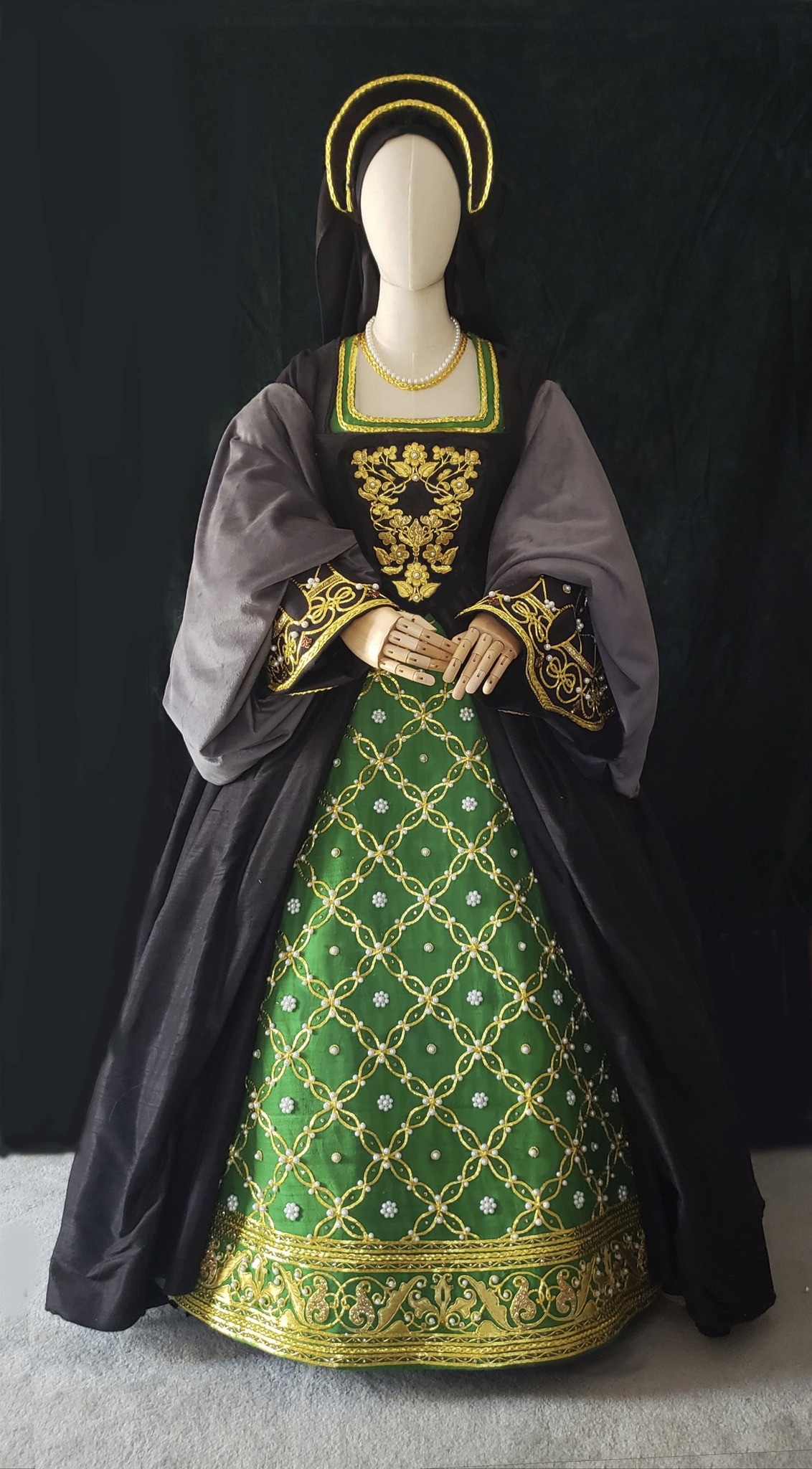 Anne Boleyn's influence on Tudor fashion, including the French gown