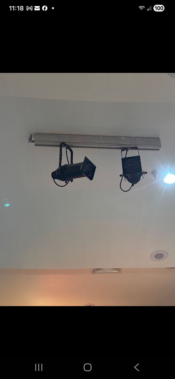 Vintage track lighting mistaken for stage lights
