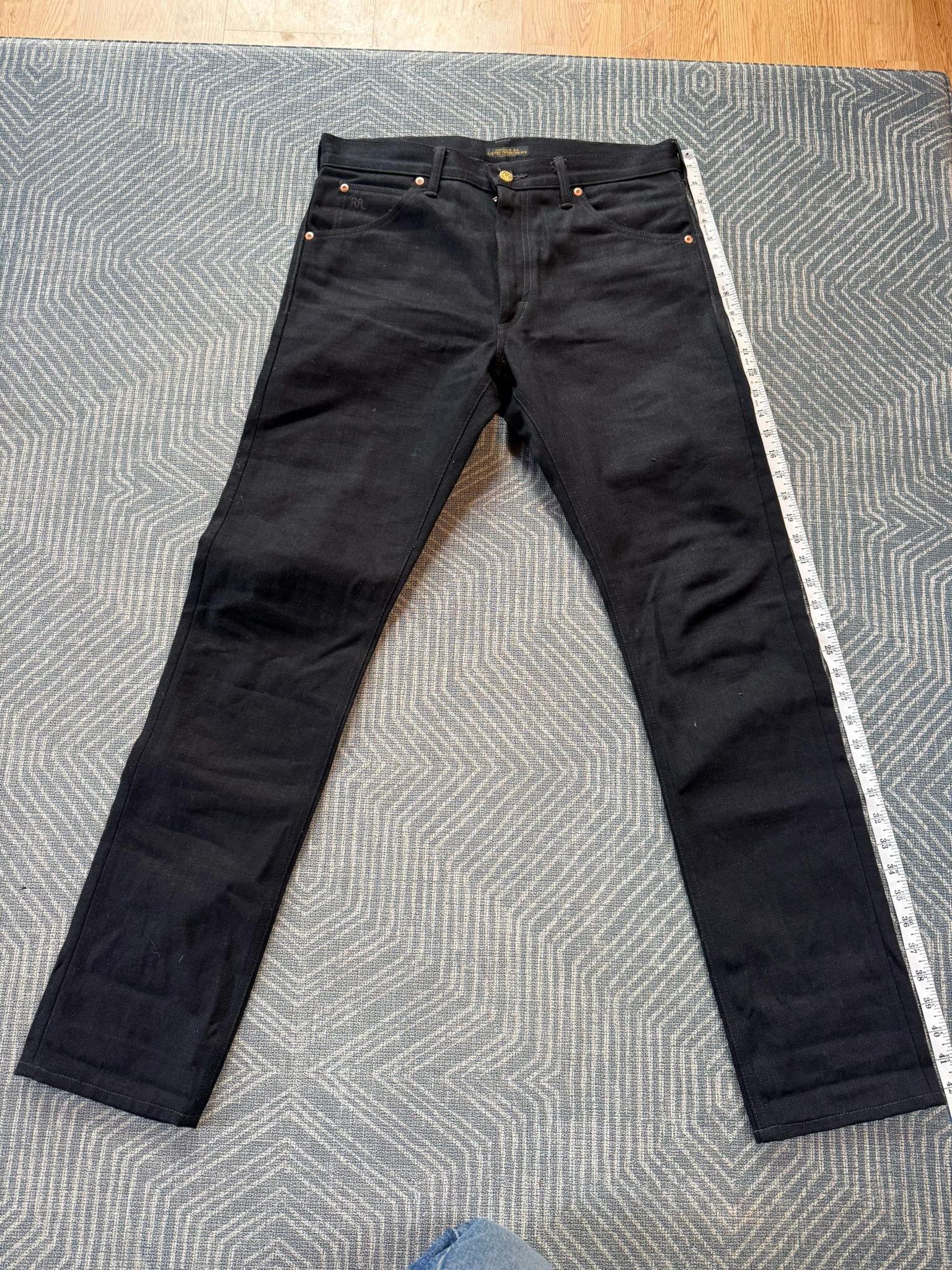 Selling a pair of Acne Studios 1981M loose-fit jeans in the 