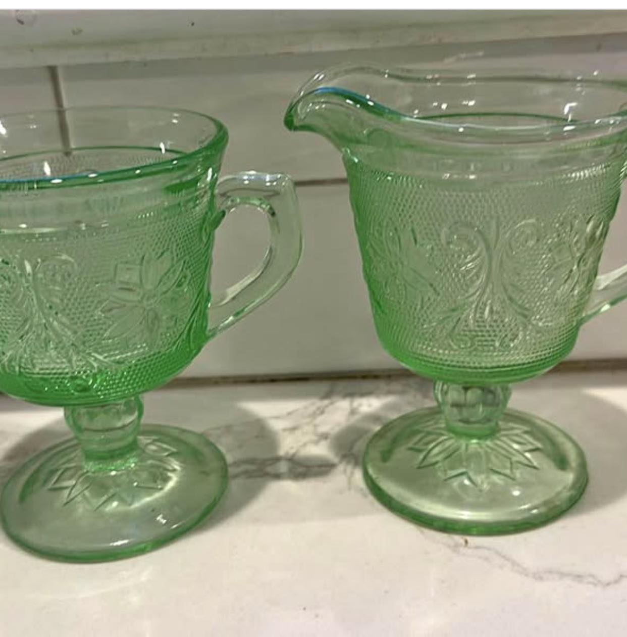 Is the Tiera Green Indiana Glass Set glow-in-the-dark?