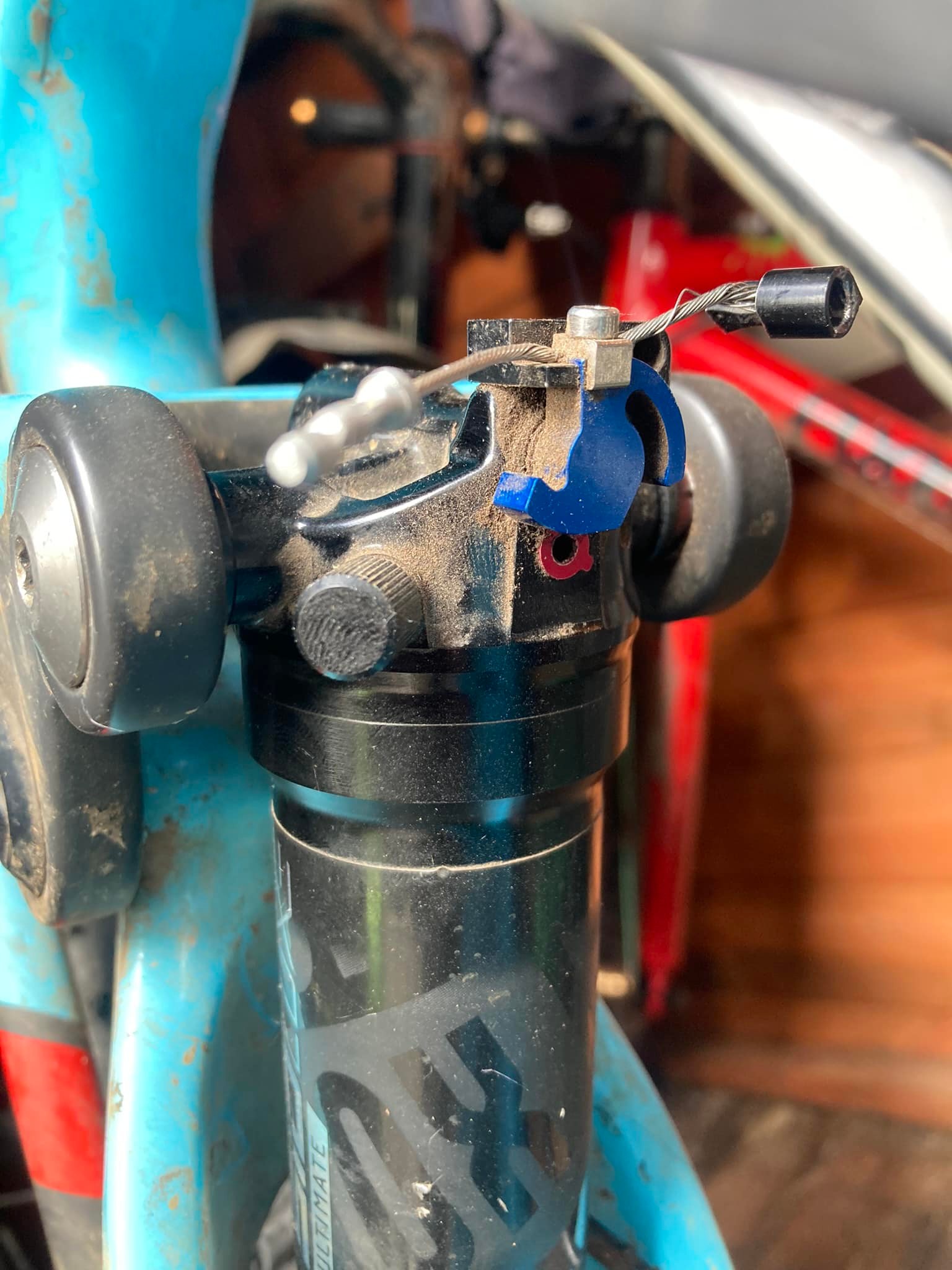 Sid Luxe rear shock remote lockout cable clamp replacement options
