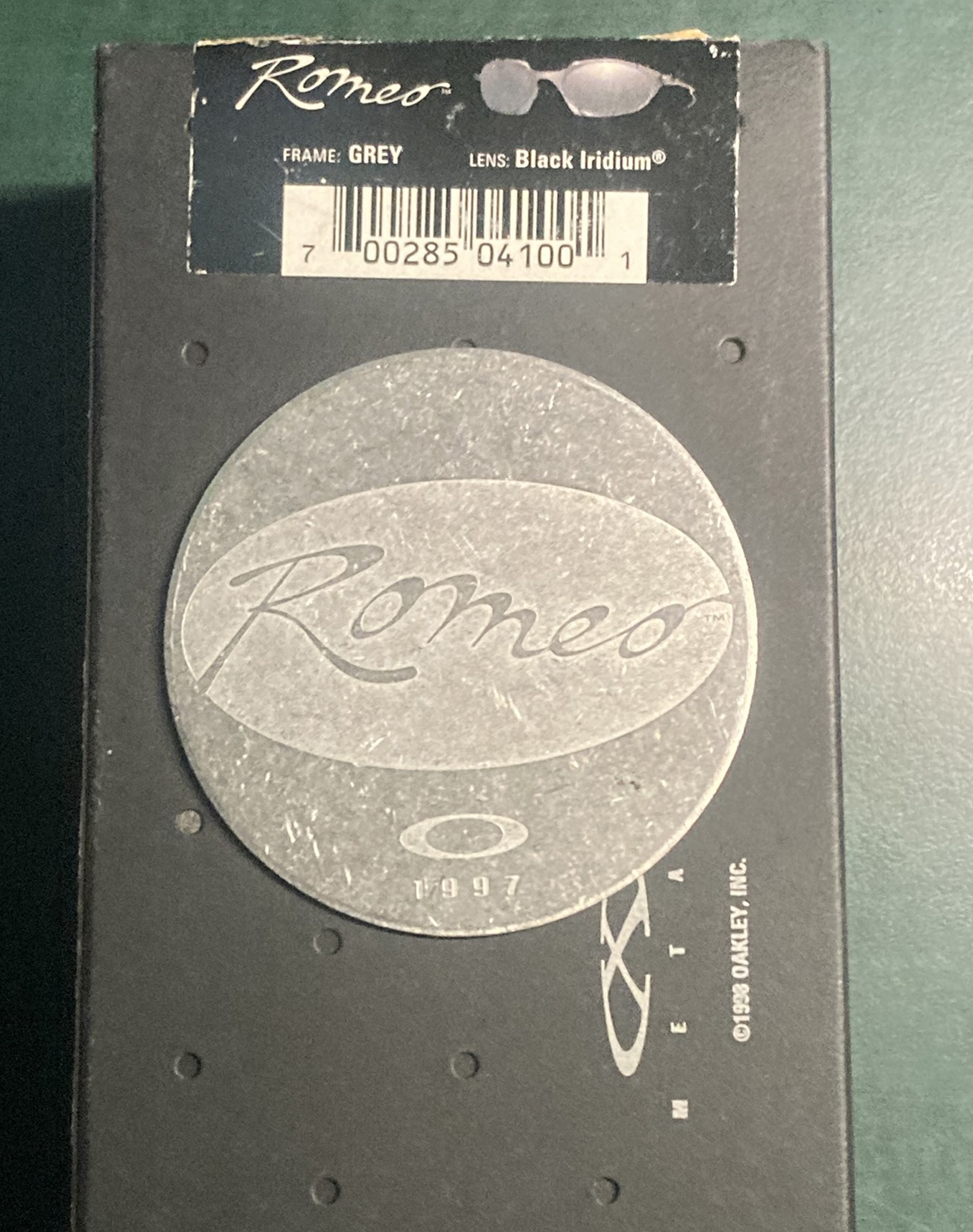 What is the value of an Oakley metal box and Romes medallion?